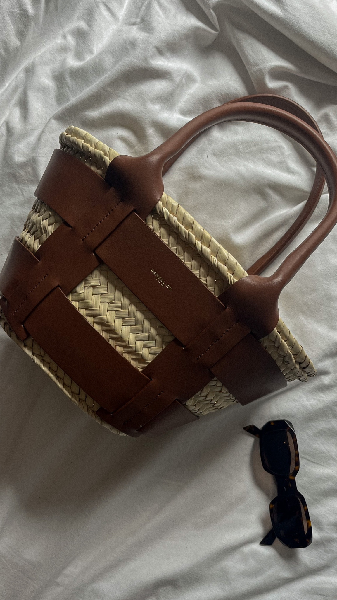 The Mini Santorini from DeMellier 🤎

The perfect straw bag for your summer holiday.  

Made of 100% cowhide leather and 100% palm leaves. 

Available in different sizes and colours! 

woven bag, outfit inspiration, holiday outfit inspo, travel bag, ethically and sustainably made, prada symbole sunglasses. 

#LTKeurope #LTKitbag #LTKSeasonal