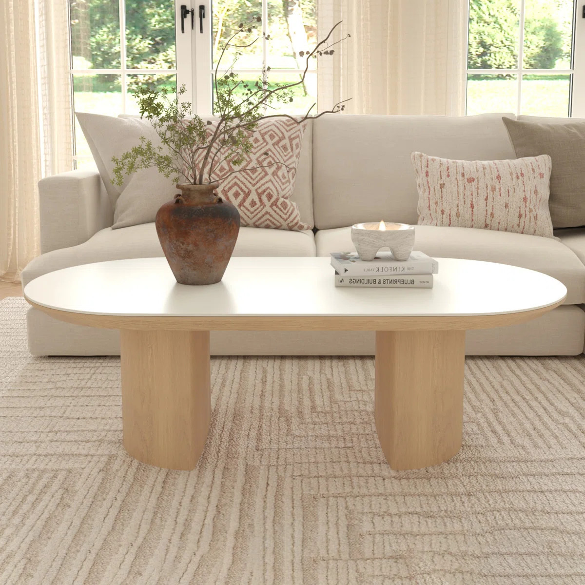 Jasmarie 51.2" x 25.6“ Oval Sintered Stone Top and Solid Oak Base Coffee Table | Wayfair North America