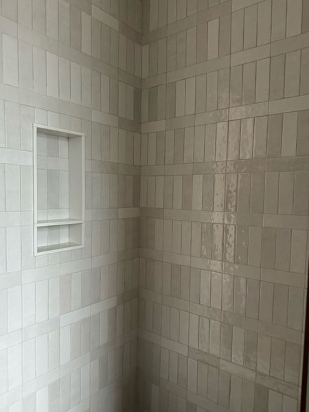 Tile shower in the downstairs bathroom. 

New home, new build, tile selections, neutral home 

#LTKFindsUnder100 #LTKHome #LTKFindsUnder50