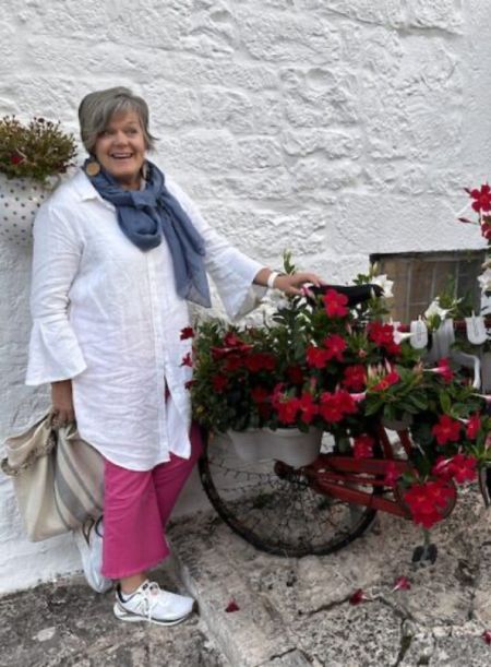 Linen is perfect for spring weather in Italy. A long linen top is super comfortable and looks stylish. Add a scarf if it gets cool or a denim jacket. Pink raw hem
Pants add a fun bright pop to your outfit. #travelinginitaly #linentunic 

#LTKover40 #LTKtravel #LTKstyletip