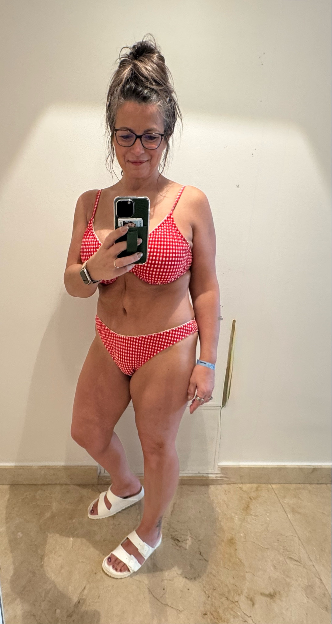Loving this swimsuit, it has a textured feel to it in this Red-and-white gingham print.  The top has an underwire & the bottoms stay put.  

#LTKSwim #LTKOver40 #LTKSeasonal
