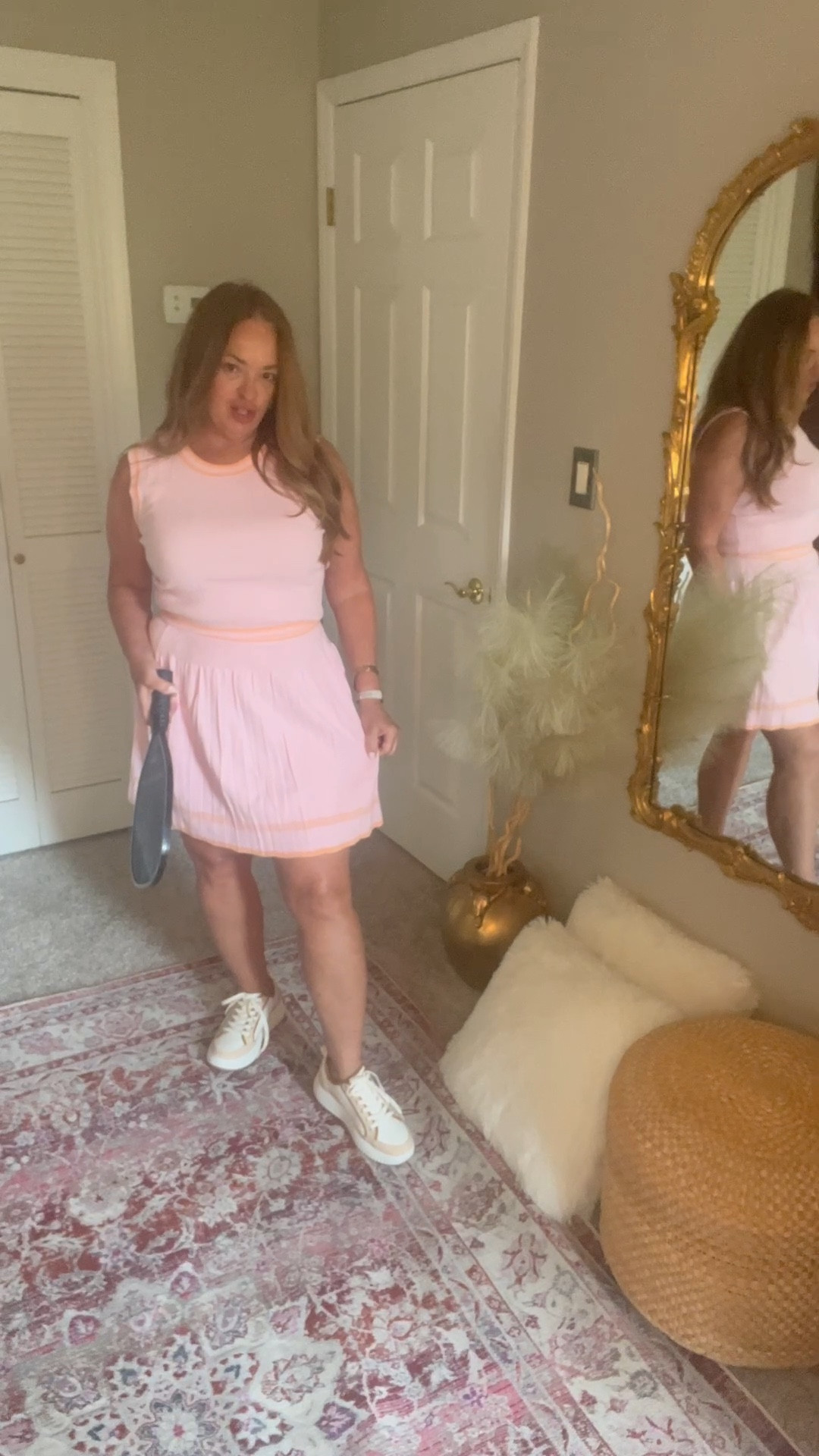 A beautiful 2 piece out door tennis/pickleball set. A lovely pink/orange combo. Available in other colors. 

#LTKTravel #LTKMidsize #LTKActive