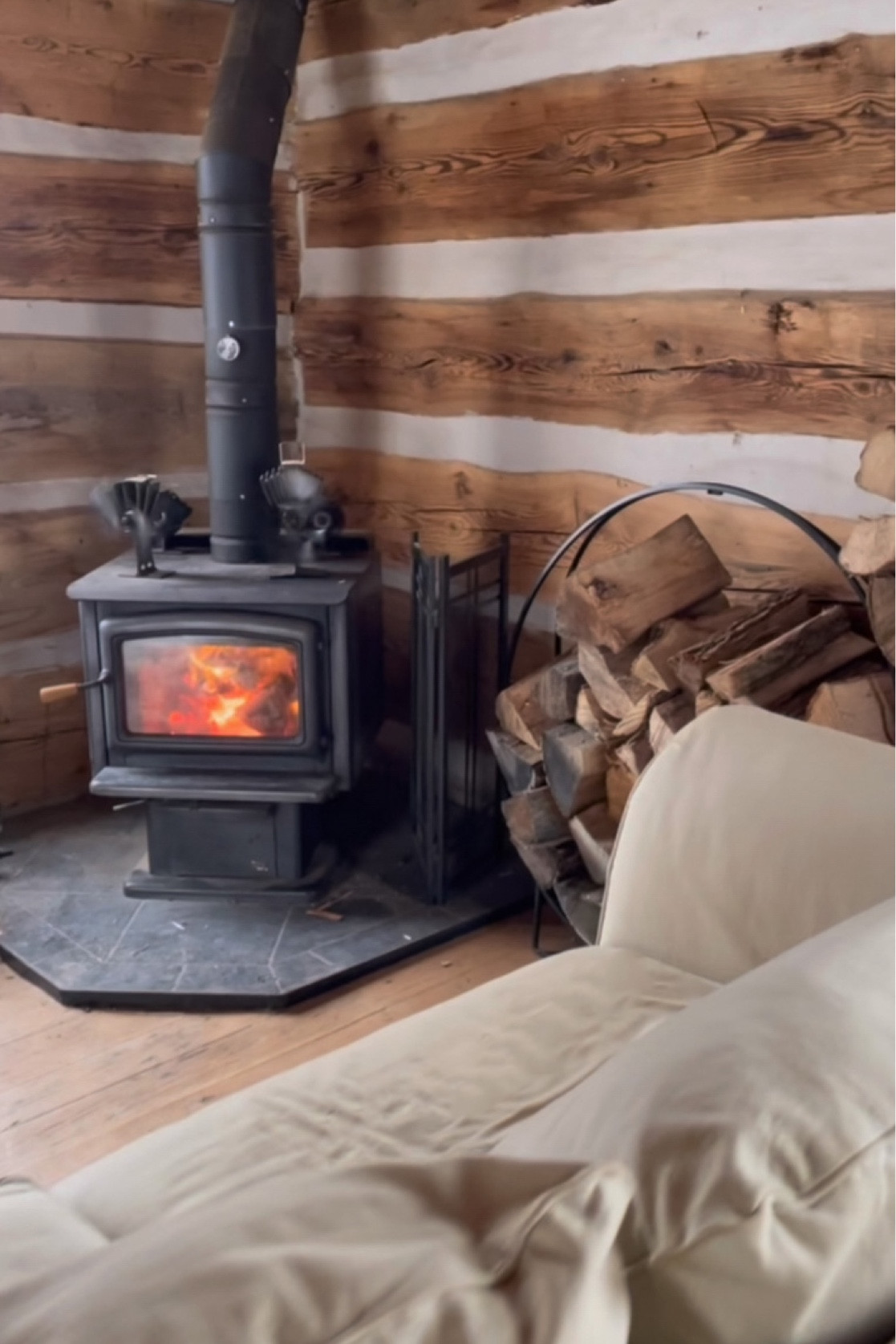 LOG CABIN LOVE 
.
Fireplace, sofa, and extra wood — you’re set! 

#LTKhome #LTKstyletip #LTKFind