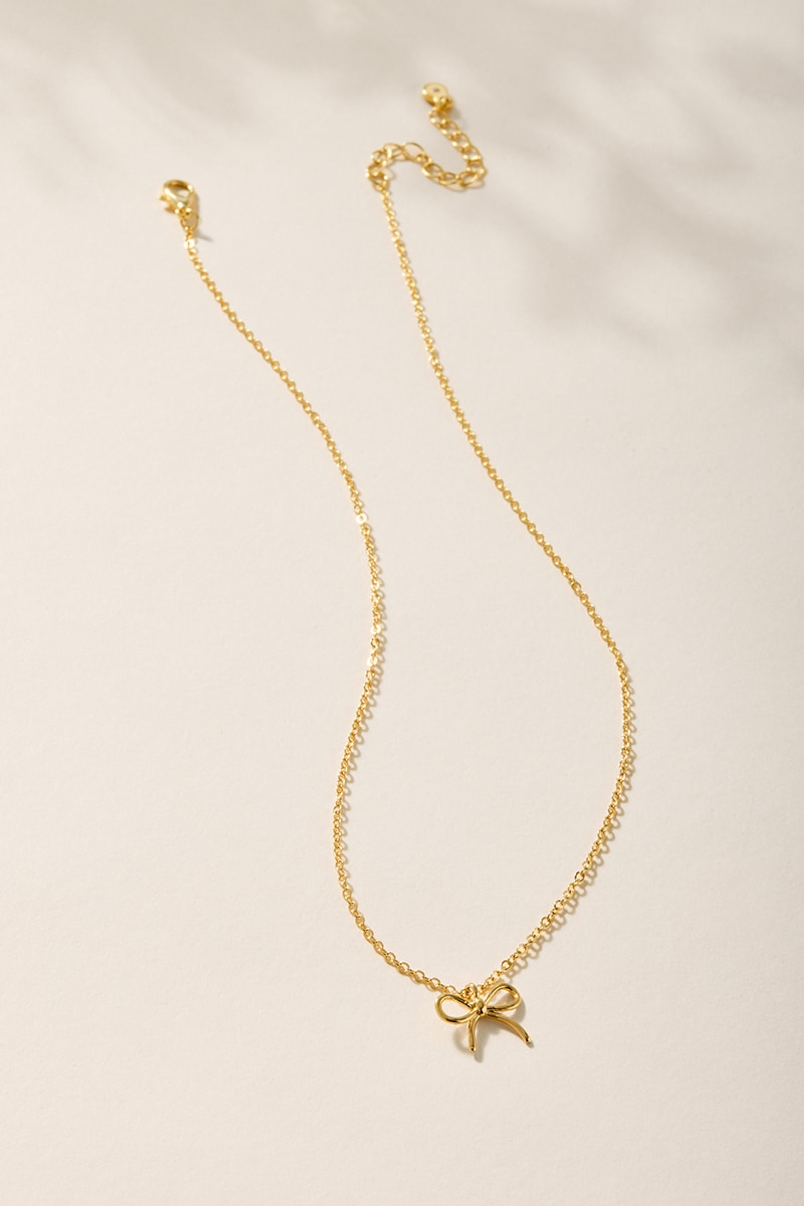 Mindy Wire Bow Pendant Necklace | Francesca's