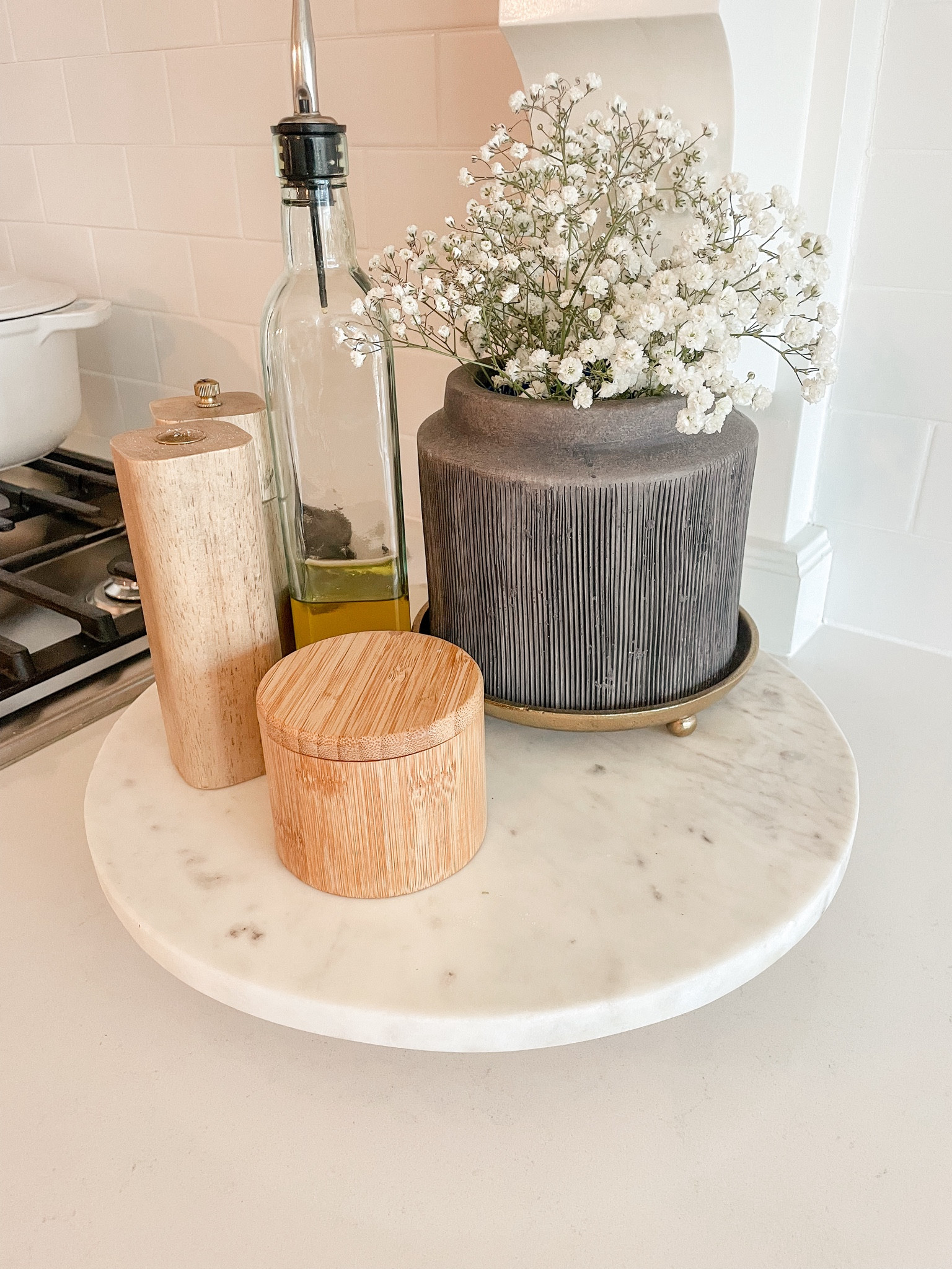 Functionality but make it stylish ✨

I love my countertop marble lazy Susan! I’m all about keeping things organized and functional especially in the kitchen! Fresh stems also add a little pep in my step! 

#LTKHome #LTKStyleTip