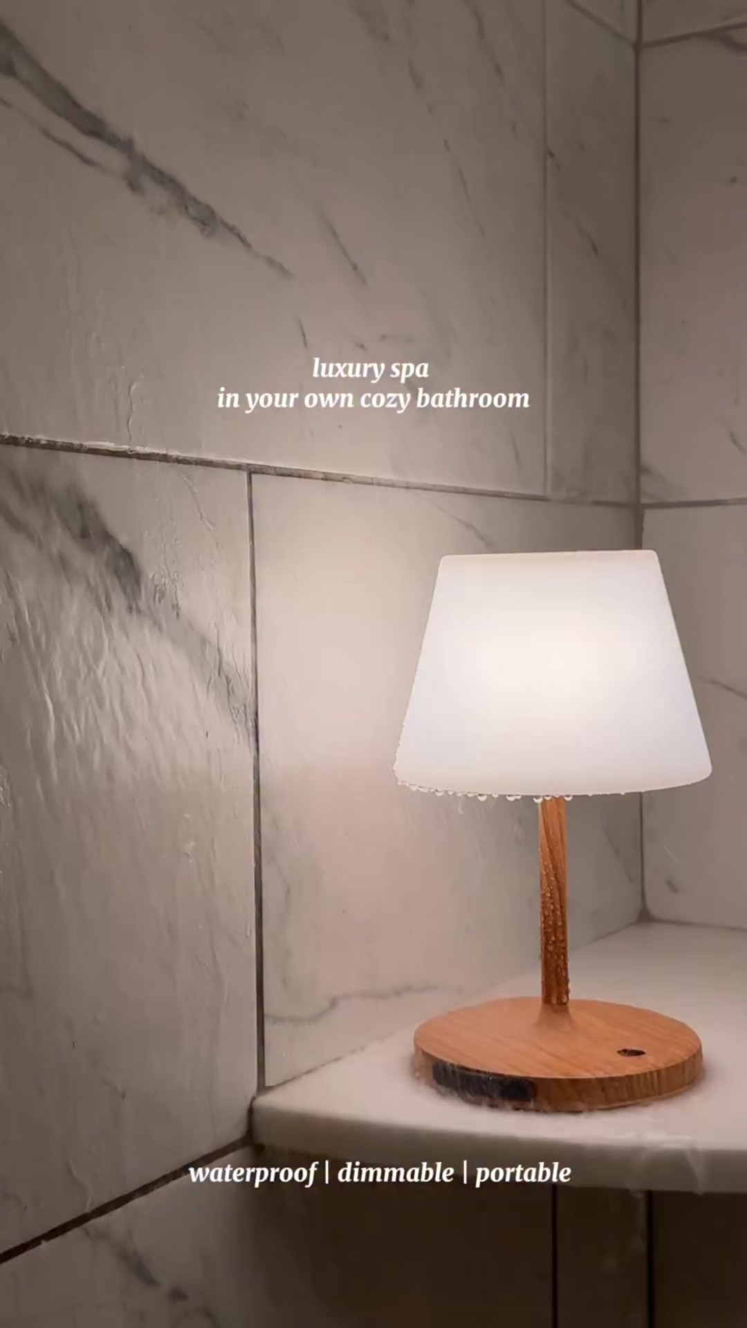 My shower must have! 🚿 Follow + Comment “LAMP” for the links to my hands down favorite shower lamp on Amazon!! Feels like a SPA 🥰🛁 Waterproof!! Cordless dimmable and portable 😍🤎 THE best way to relax!!! #amazonbathroom