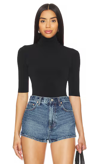 Slim Fit Short Sleeve Turtleneck Top in Black | Revolve Clothing (Global)