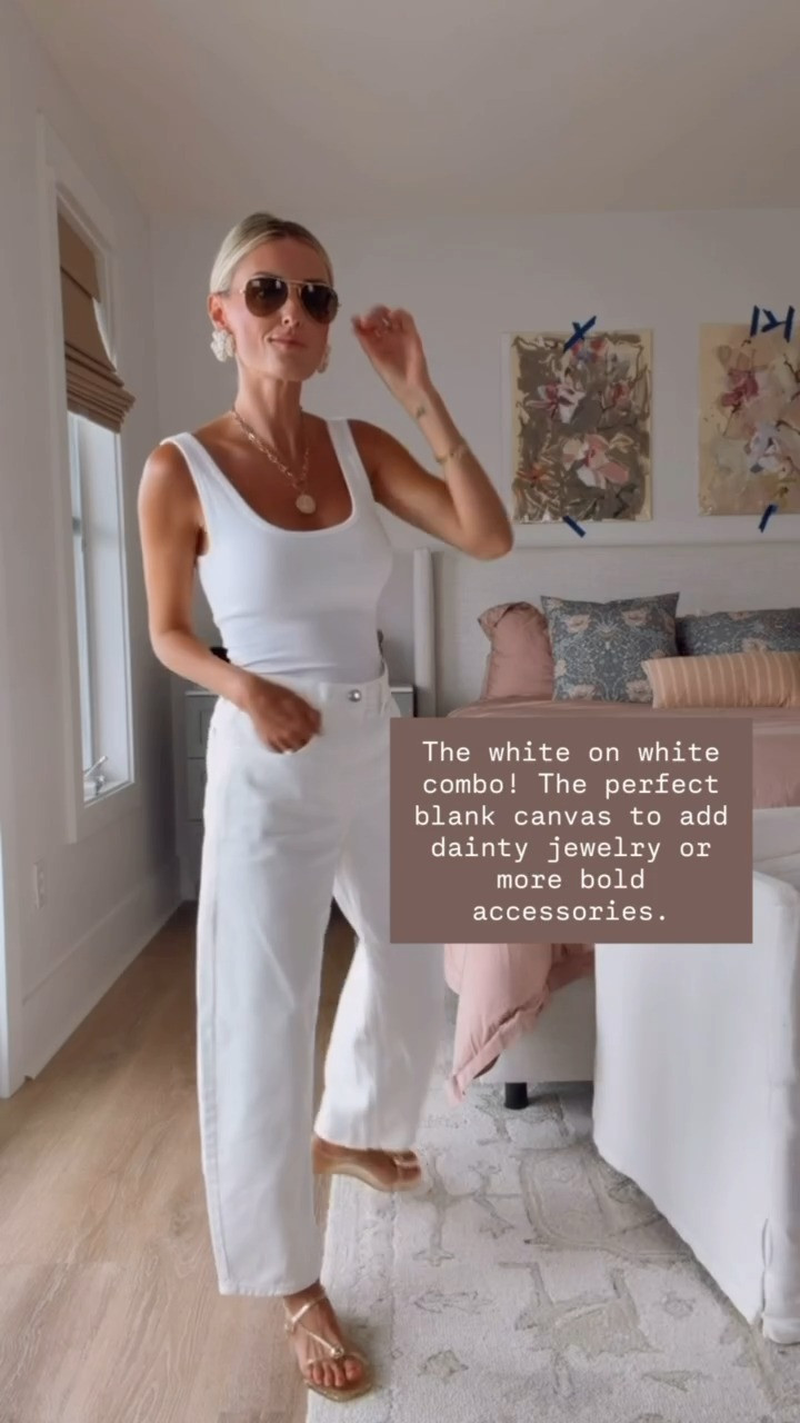Love this classic white on white look with these closet staples! I have loved this ribbed white tank with the built-in bra - it's even on sale! Wearing S/4!

Loverly Grey, white tank, white jeans, barrel jeans, sandals, jelly sandals, summer outfit, closet staples 

 #LTKSeasonal