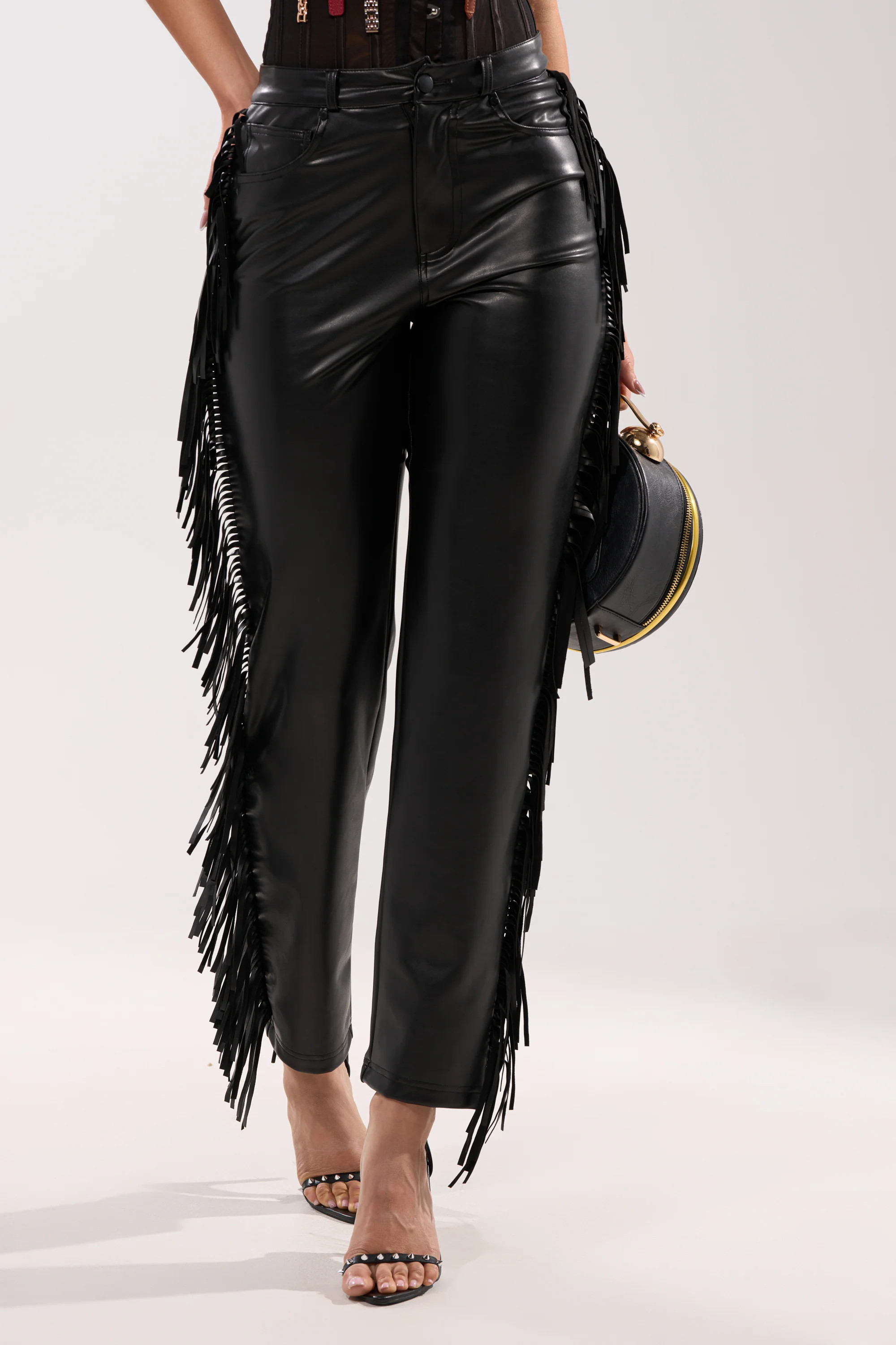 LETS GO TO THE RODEO FRINGE FAUX LEATHER PANT | AKIRA