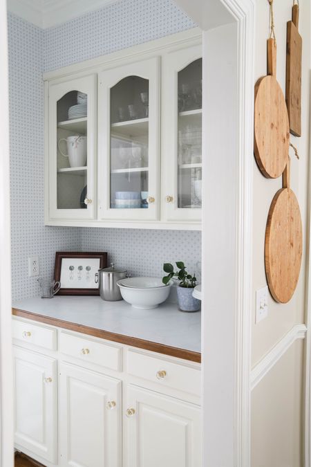 My pretty new blue and white butler’s pantry makeover is everything I dreamed it could be! The painted “marble” countertops and geometric wallpaper completely changed the space! 

#LTKhome