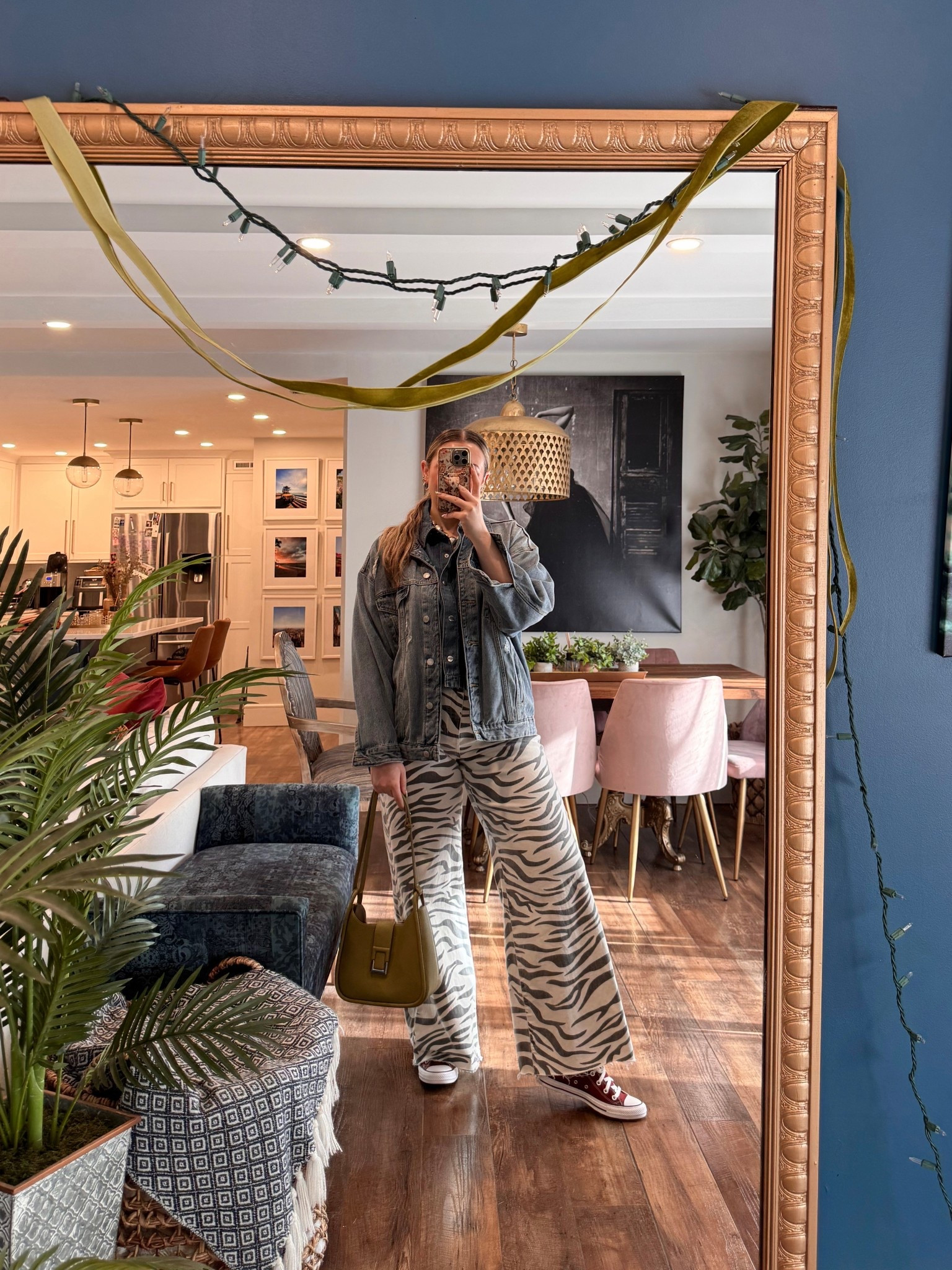 Spring outfits 2026. Obsessed with this funky Spring outfit! Madewell boxy airy denim short sleeve button up wearing a large for an oversized fit (currently on sale 25% off). Daze Denim Far Out High Waist Wide Leg Jeans in Zebra wearing a 31 but probably could've gotten a 30.  

 #LTKSpringSale #LTKootd #LTKMidsize