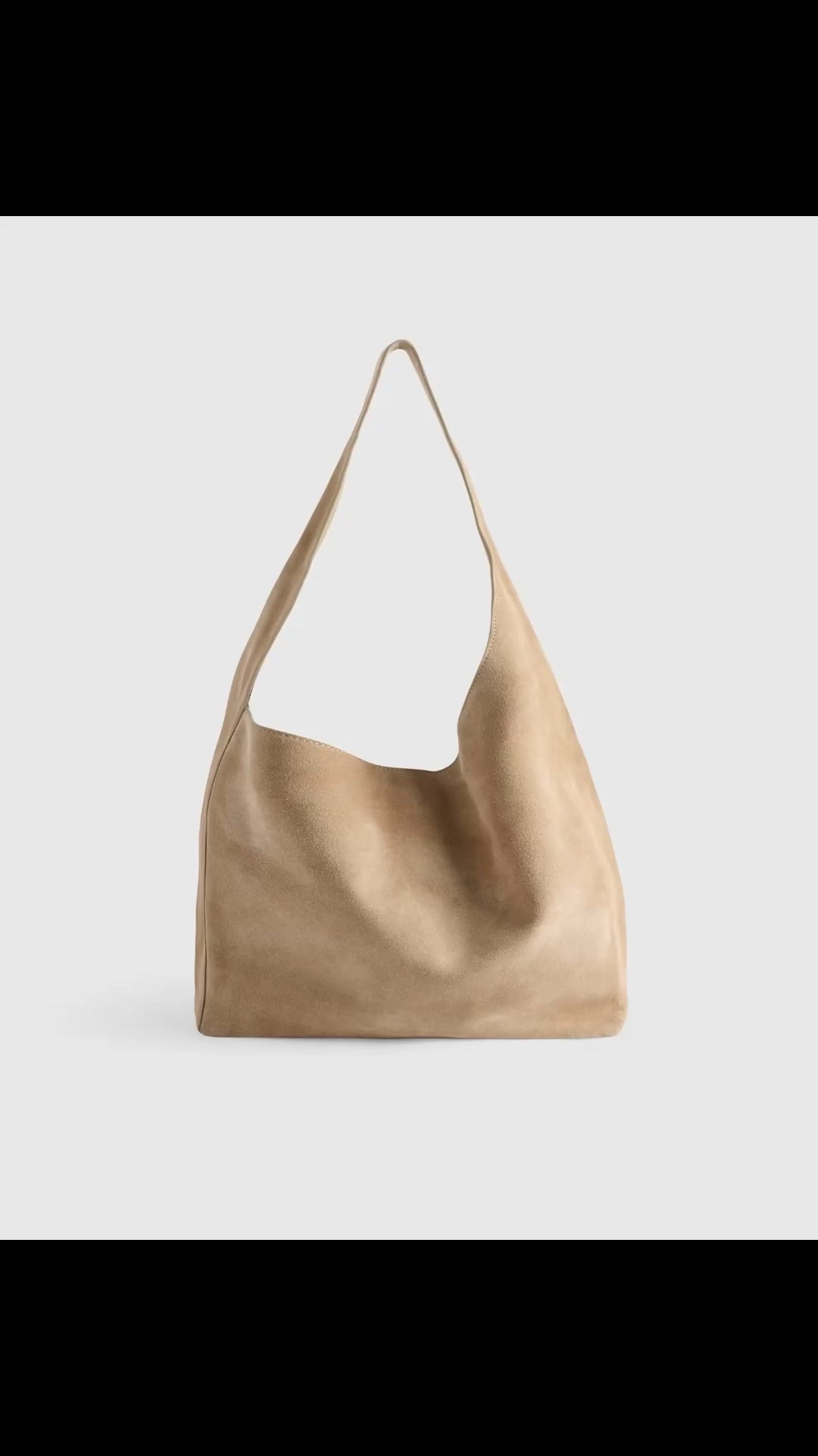 This Italian Suede Slouch Bag from Quince is stunning!

This is the perfect go-to handbag for fall!

It goes with everything and looks very expensive even though the price tag says differently.