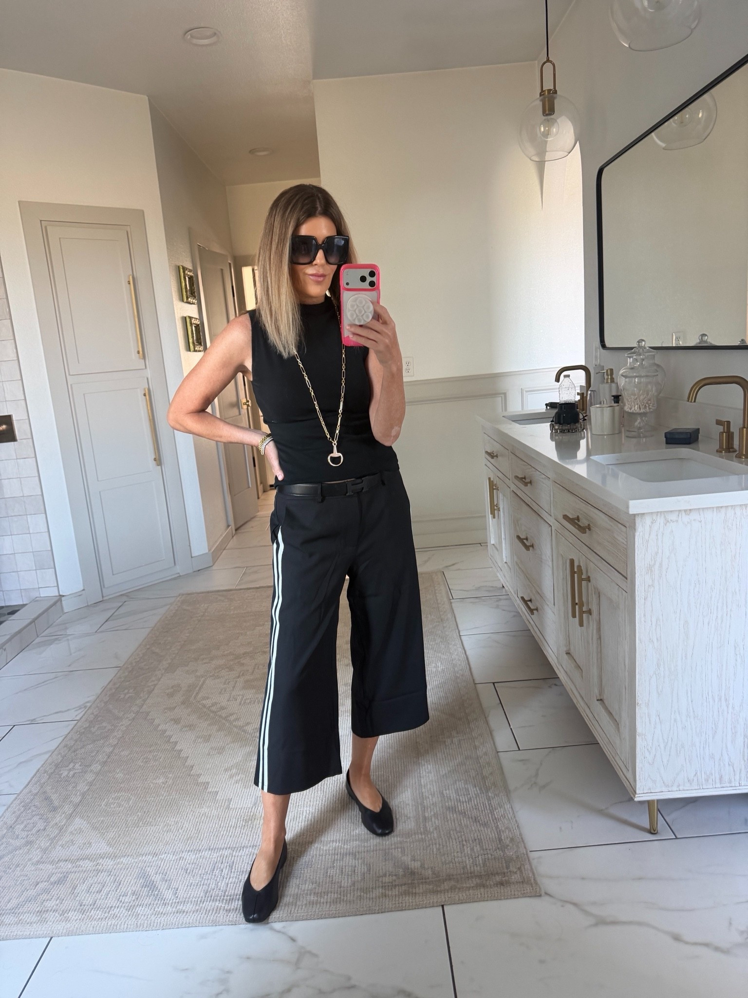 Wearing a size small in low rise cropped track pants. If between sizes size down. Small tank. Shoes fit tts

#LTKOver40 #LTKootd