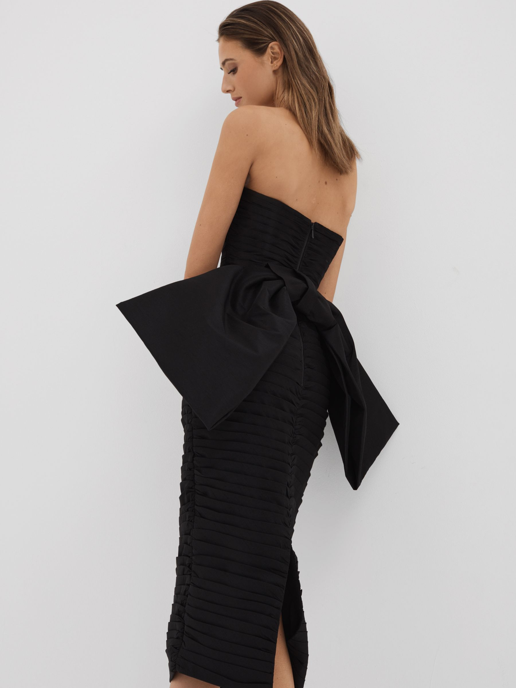Rachel Gilbert Pleated Bow Back Midi Dress in Black | Reiss UK