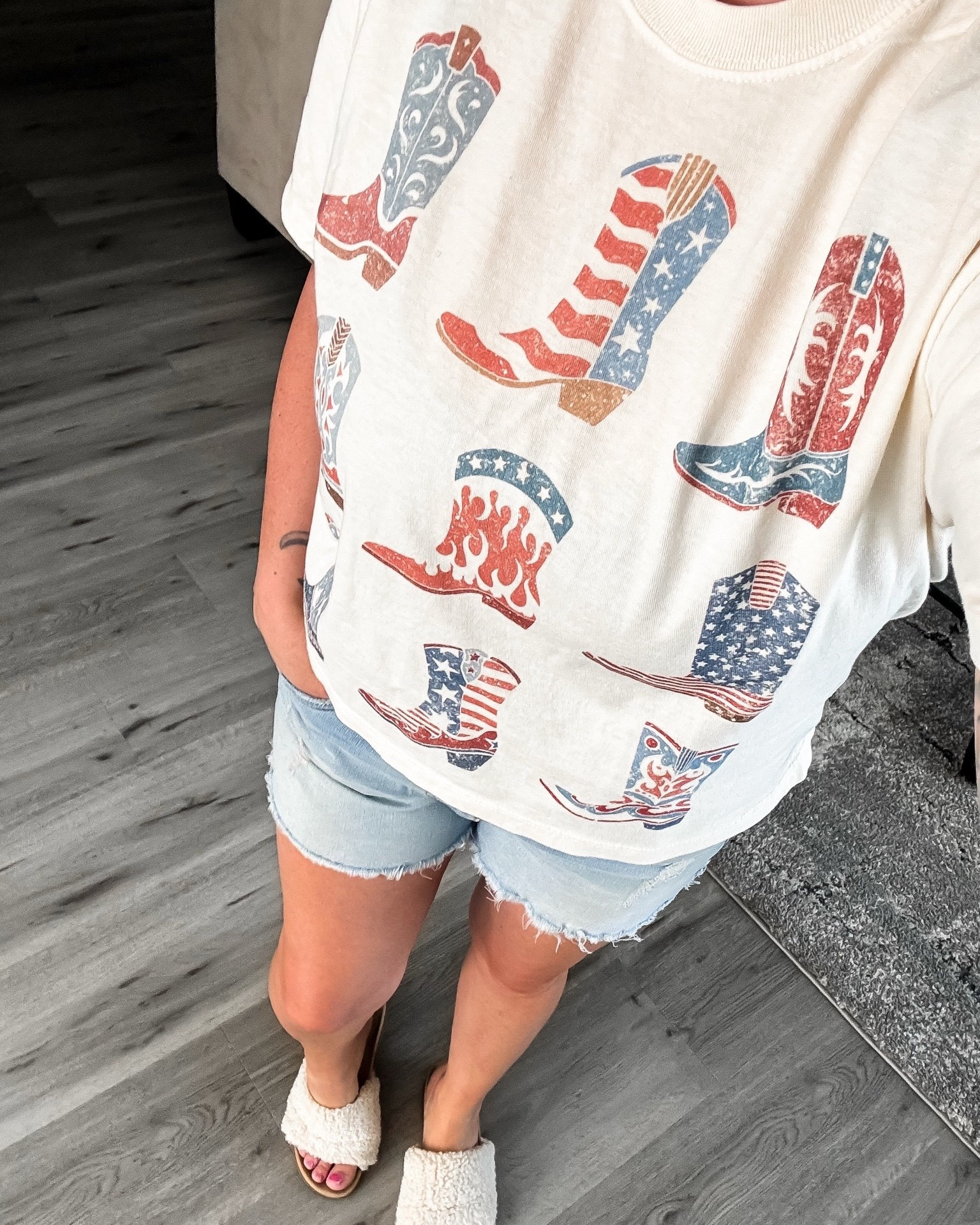 🚨30% off
Saddle up for summer in this adorable patriotic graphic tee! Featuring a fun mix of vintage-inspired cowboy boots and hats with classic red, white, and blue details, this oversized tee is the perfect blend of western charm and Americana style. Pair it with your favorite denim shorts, jeans, or leggings for backyard BBQs, fireworks, rodeos, country concerts, Memorial Day, and all your Fourth of July celebrations. Comfortable, casual, and effortlessly cute—this is the kind of graphic tee you’ll reach for all season long! ❤️🤍💙
I got a size M for larger chest, but could have done a small.

#PatrioticStyle #FourthOfJulyOutfit #AmericanaStyle #WesternFashion #CowgirlStyle #CountryConcertOutfit #SummerStyle #GraphicTeeLove #RedWhiteAndBlue #USAStyle #PatrioticOutfit #MemorialDayStyle #CowboyBoots #WesternChic #CasualSummerOutfit #SummerFashionFinds #LTKFashion #LTKStyle #LTKSummer #WeekendStyle #CountryGirlStyle #TrendyGraphicTees #OOTDInspiration #ShopTheLook #ViralFashionFinds

patriotic graphic tee • patriotic t shirt women • 4th of july shirt • americana graphic tee • western patriotic shirt • cowboy boots graphic tee • patriotic western outfit • red white and blue shirt • memorial day outfit • fourth of july outfit women • country concert outfit • cowgirl graphic tee • western fashion women • oversized patriotic tee • summer graphic tee • casual summer outfit • trendy patriotic clothing • americana fashion • western style shirt • rodeo outfit women • country girl fashion • patriotic boutique clothing • cute graphic tees for women • holiday weekend outfit • july 4th apparel
@Mountain Moverz

#LTKootd #LTKSaleAlert #LTKvlog