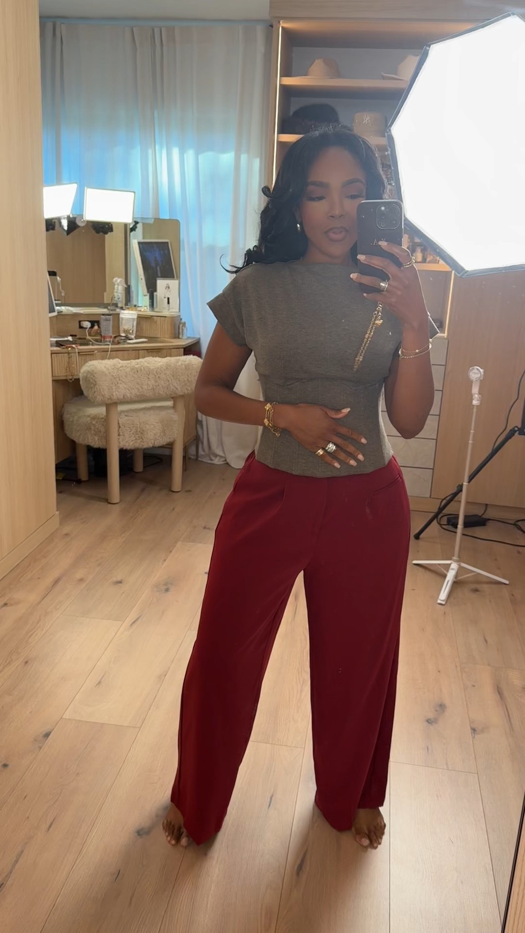 Effortlessly polished with an everyday edge — a neutral fitted tee paired with rich burgundy trousers for an elevated casual look. Easy to dress up or down, this is one of those outfits you’ll reach for on repeat because the cost per wear drops fast.

Perfect for workdays, casual meetings, errands, or a relaxed dinner out.

📏 Sizing:
Top: Size Small  
Pants: 27 Long  
Height: 5'4" | 138 lbs | 34D bust | 27" waist | 40" hips

Tap to get details and shop this look instantly. This is a long-term shopping strategy staple that styles multiple ways with jackets, sneakers, or heels.

A neutral everyday outfit, elevated basics, casual chic style, flattering high waisted pants, wardrobe essentials for women, versatile capsule wardrobe pieces.

Follow me on Instagram and YouTube @kirasfashionfinds