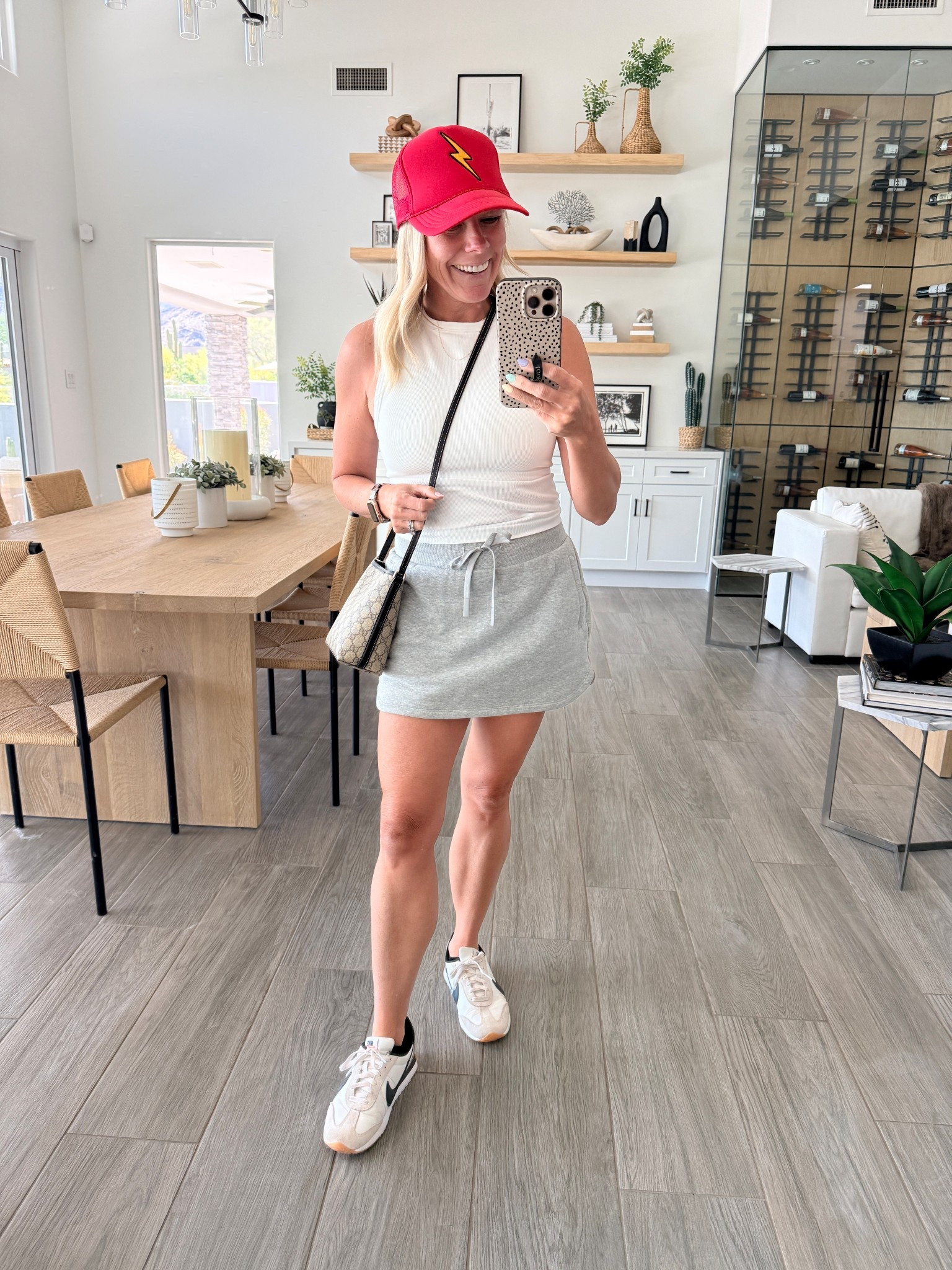 Size medium tank top, linked a similar grey skort, Nikes tts and red hat 

#LTKOver40 #LTKmomlife #LTKootd