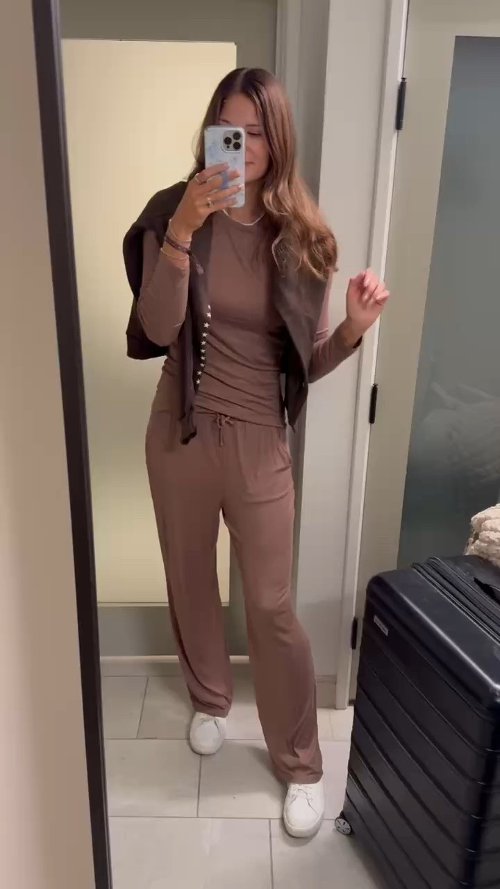 This monochromatic travel outfit is such a good airport look. The matching set keeps it comfortable, while the layered vest and sneakers make it feel more put together.

travel outfit, airport outfit, matching set, comfy travel outfit, neutral outfit, travel style, fall travel outfit, athleisure outfit, casual outfit, everyday style, StangandCo

#LTKTravel #LTKTall #LTKootd