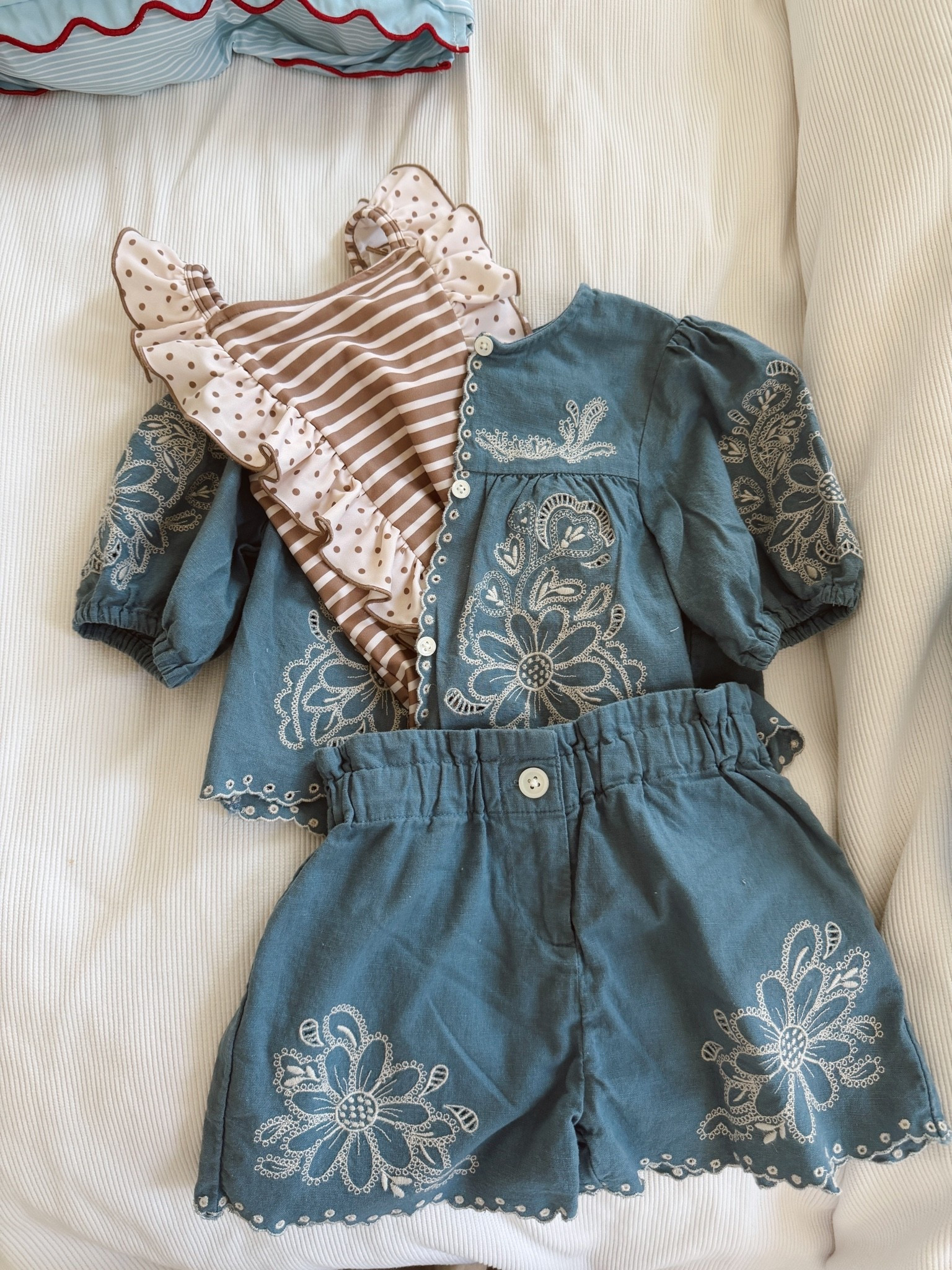 Cute little toddler swim outfit with one piece that is adorable on styled with matching embroidered blouse and shorts

#LTKKids #LTKmomlife