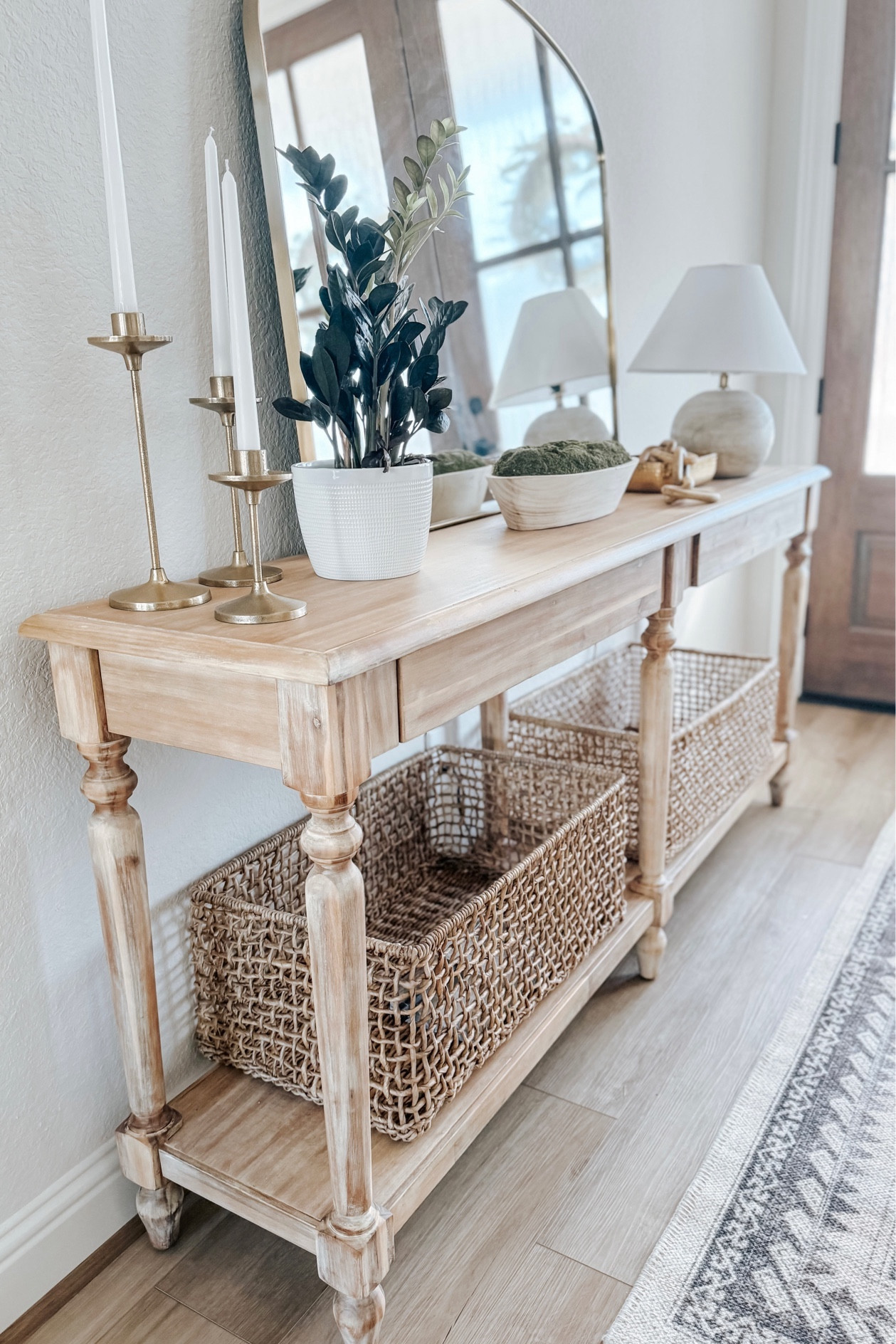 Love the earthy tones here! Exact console table is from World Market, mirror, candle holders, and gold bowl from homegoods.  Linked similar 🫶🏼

#LTKU #LTKstyletip #LTKhome