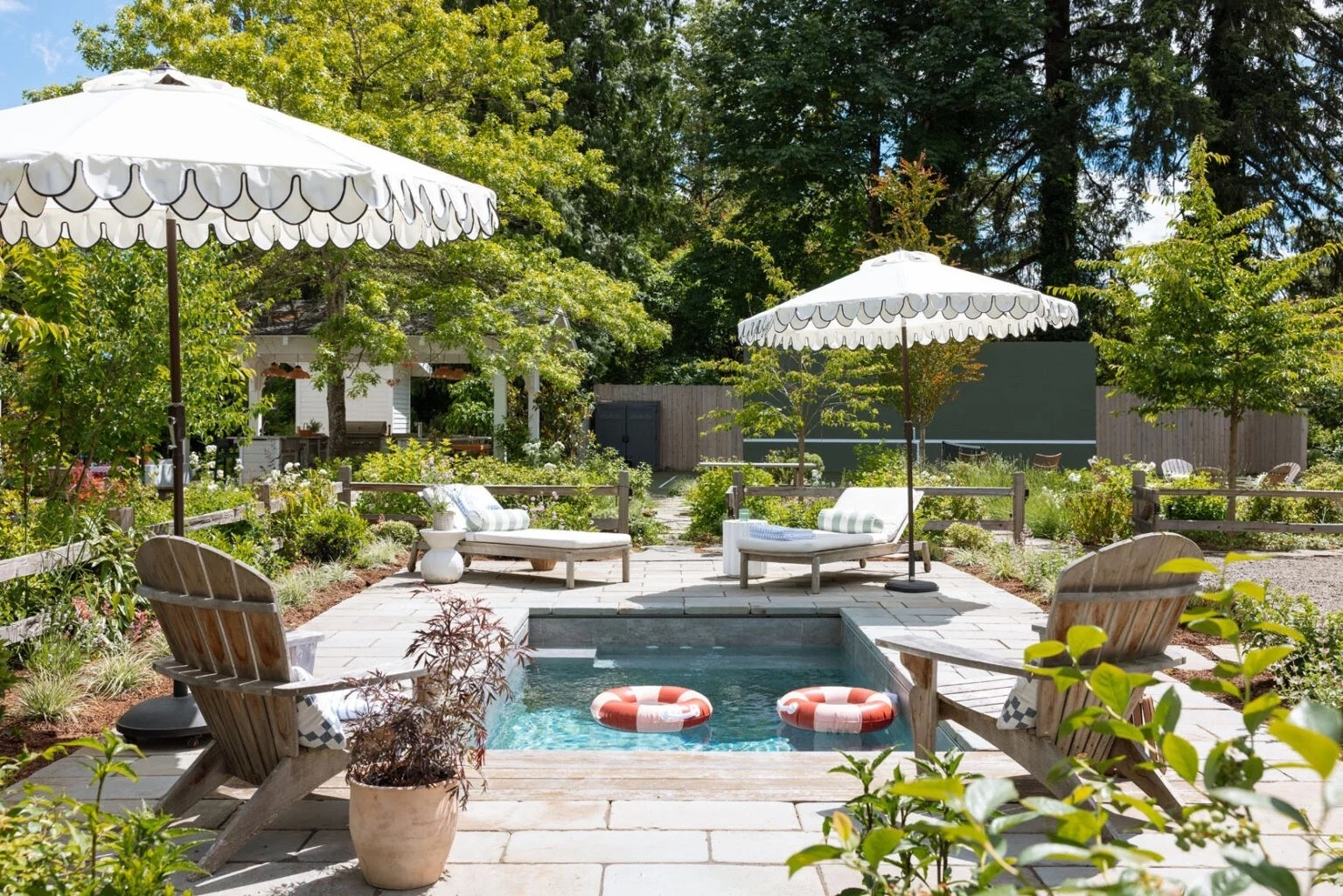 I partnered with @Wayfair to refresh to pool area and I’M IN HEAVEN 🥰  it’s feeling so lush and calming - easily my favorite part of the yard. We grabbed some new umbrellas, floaties, and other goodies and I’m obsessed. Check out Wayfair if you need to make some summer pool updates! #wayfairpartner #wishyouwerehere #outdoor #Wayfair #Ad