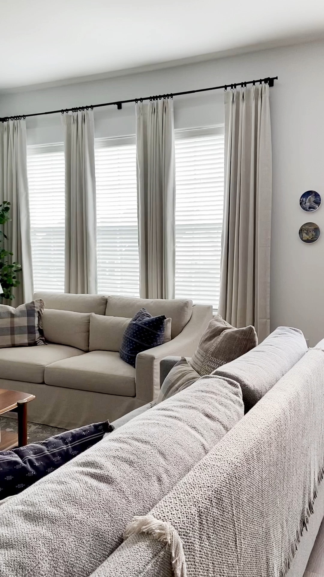 Our Living Room 🤍
#livingroomfurniture #livingroomdesign #sofa #loveseat #couch #arearug #curtains #homedecor #throwpillows #sconces #coffeetable #decorativebaskets 

#LTKHome