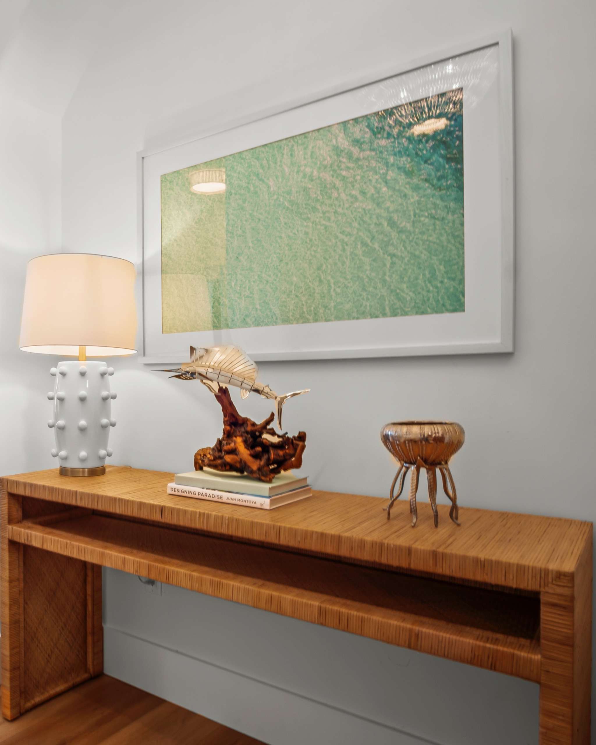 Bringing natural textures to this coastal home with a stunning rattan console table. Perfect for adding warmth and style while staying true to seaside charm. Shop exact and similar pieces to get the look! #CoastalLiving #RattanFurniture #NaturalTextures #BeachHouseStyle #CoastalHomeDecor #SeasideChic #InteriorInspo #EffortlessElegance #ChicAndNatural #CoastalVibes

#LTKHome