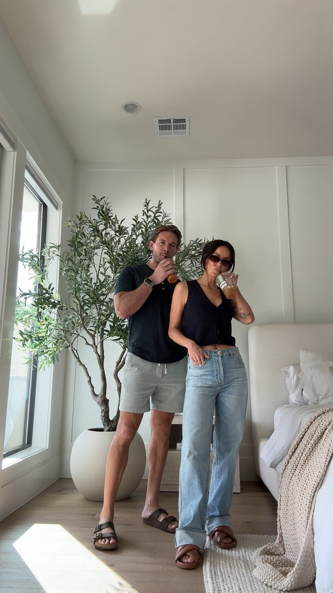 $15 sweater vest from h&m. 
Wide leg jeans are Annina Jean from citizens of humanity. Anine Bing sandals. Amazon sunglasses  