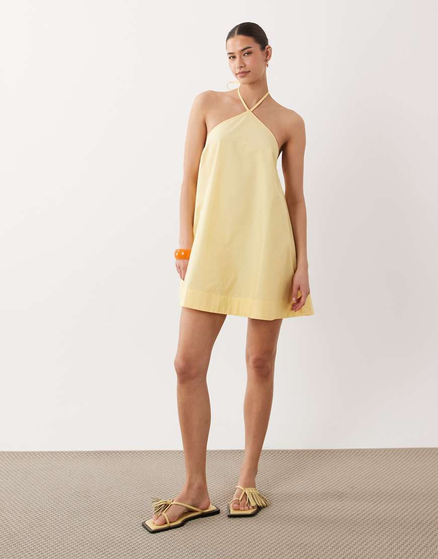 ASOS DESIGN poplin halter neck swing mini sundress in lemon-Yellow | ASOS (Global)