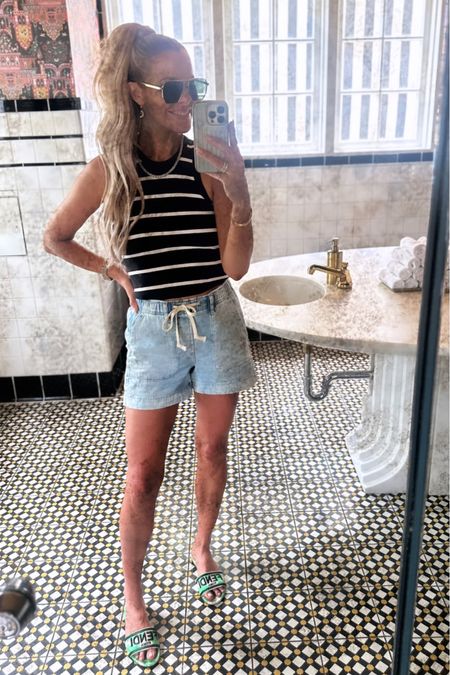 Bathroom selfies // Picked up this tank last week and definitely want it in more colors! Both the tank and the shorts stretch a bit so go down one size!   

#LTKFind #LTKshoecrush #LTKunder50