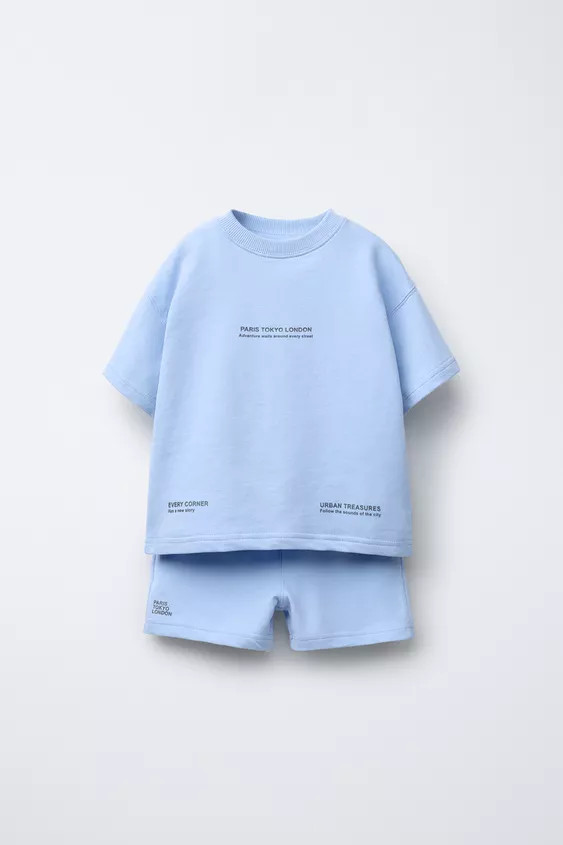 Two-piece set. Short sleeve T-shirt with round neck. Embossed text detail on front. Bermuda short... | Zara US
