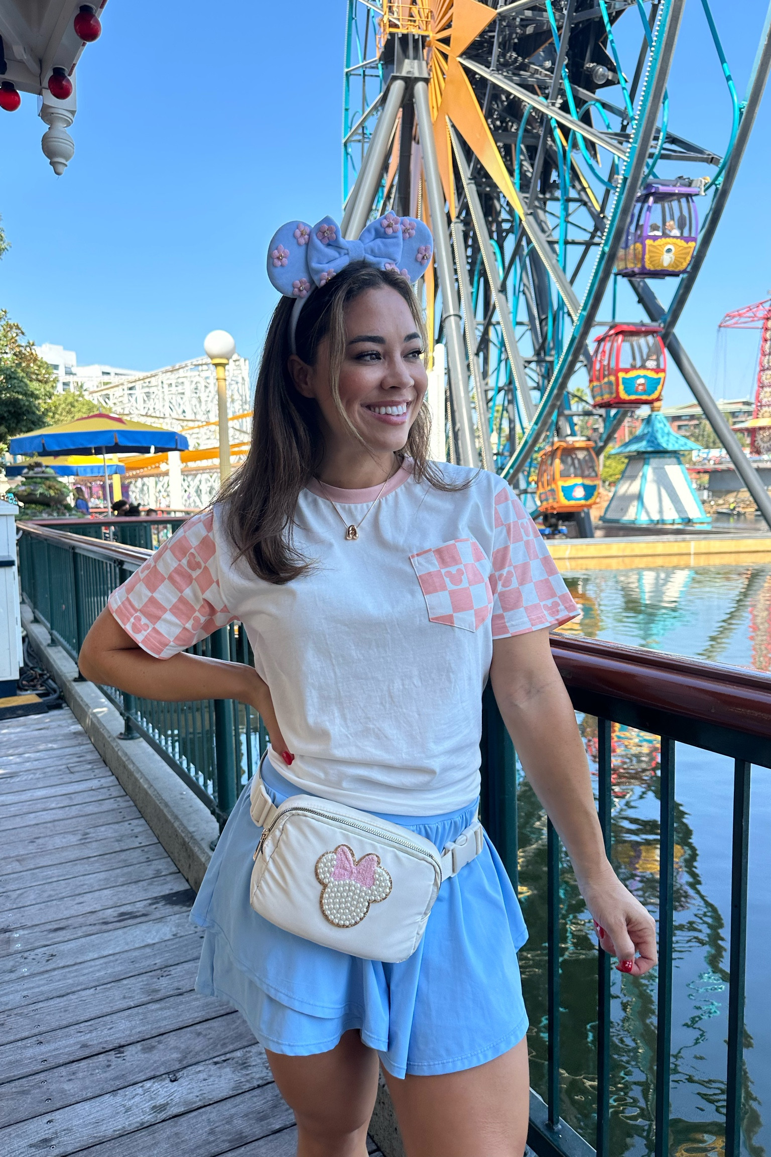 Linking my affordable Minnie ears // tennis skirt // make your own Minnie loose Fanny pack/ crossbody// the shirt is from a small shop! #disneyootd #disneylandoutfits
