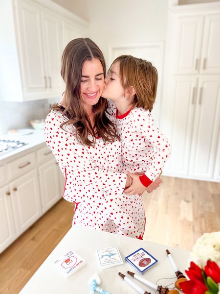 Have the cutest Valentine’s Day helper this morning 💌 These matching heart pajamas are everything ❤️❤️❤️ The softest Pima cotton (size up, because they do shrink) 

#LTKfindsunder50 #LTKSeasonal #LTKkids