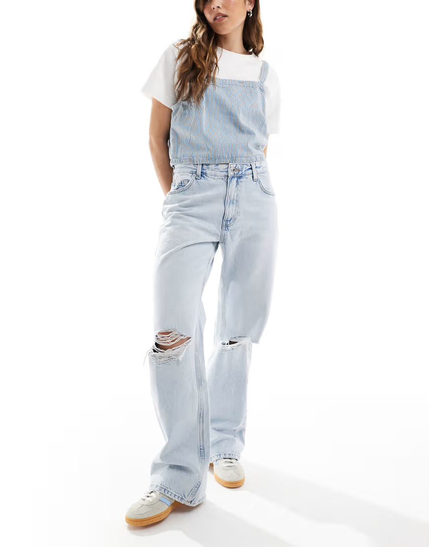 Bershka ripped knee wide leg jeans in super light wash-Blue | ASOS (Global)