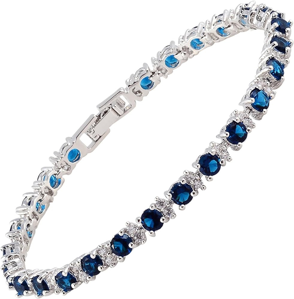 RIZILIA Round Multi-Color CZ Birthstone White Gold Plated Tennis Bracelet, 7" | Amazon (US)