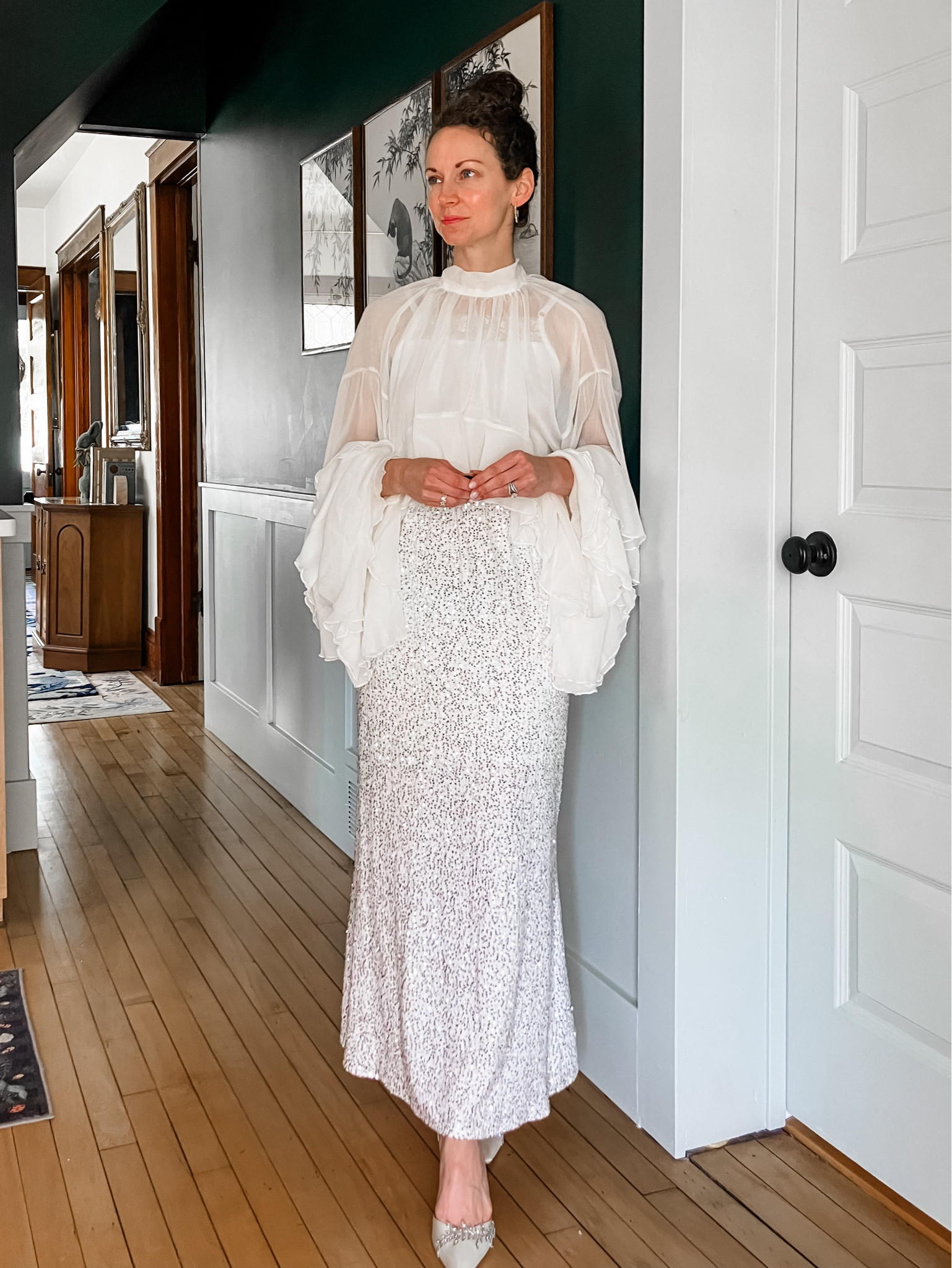 A statement top for summer!
White chiffon statement top from Chicwish. 
Sequin skirt from Chicwish. 
Crystal hoop earrings from a local boutique, linking similar. 
White heels from Bella Belle Shoes. 
Cropped lace top from Amazon. 
Petite outfit. Neutral outfit. Summer outfit. Party outfit. Modest outfit  

#LTKOver40 #LTKMothersDay #LTKgrwm