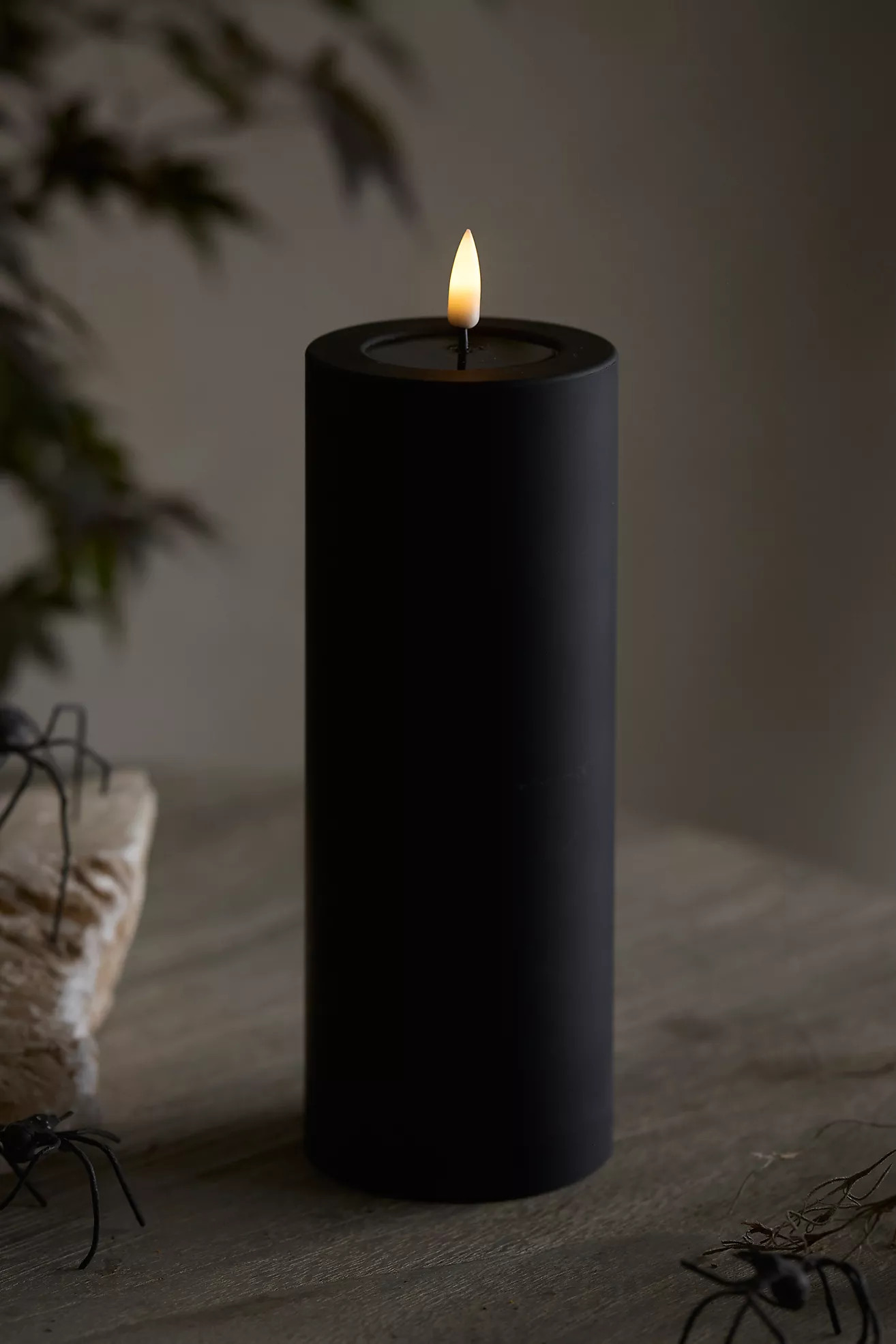 Flameless Black Outdoor Pillar Candle | Anthropologie (US)