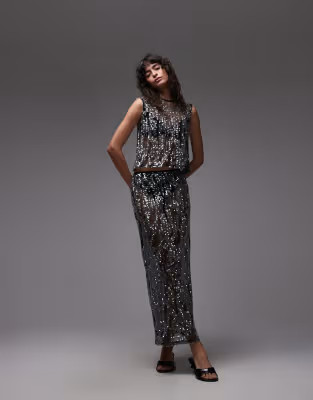 ASOS DESIGN sheer sequin mesh maxi skirt in black | ASOS (Global)