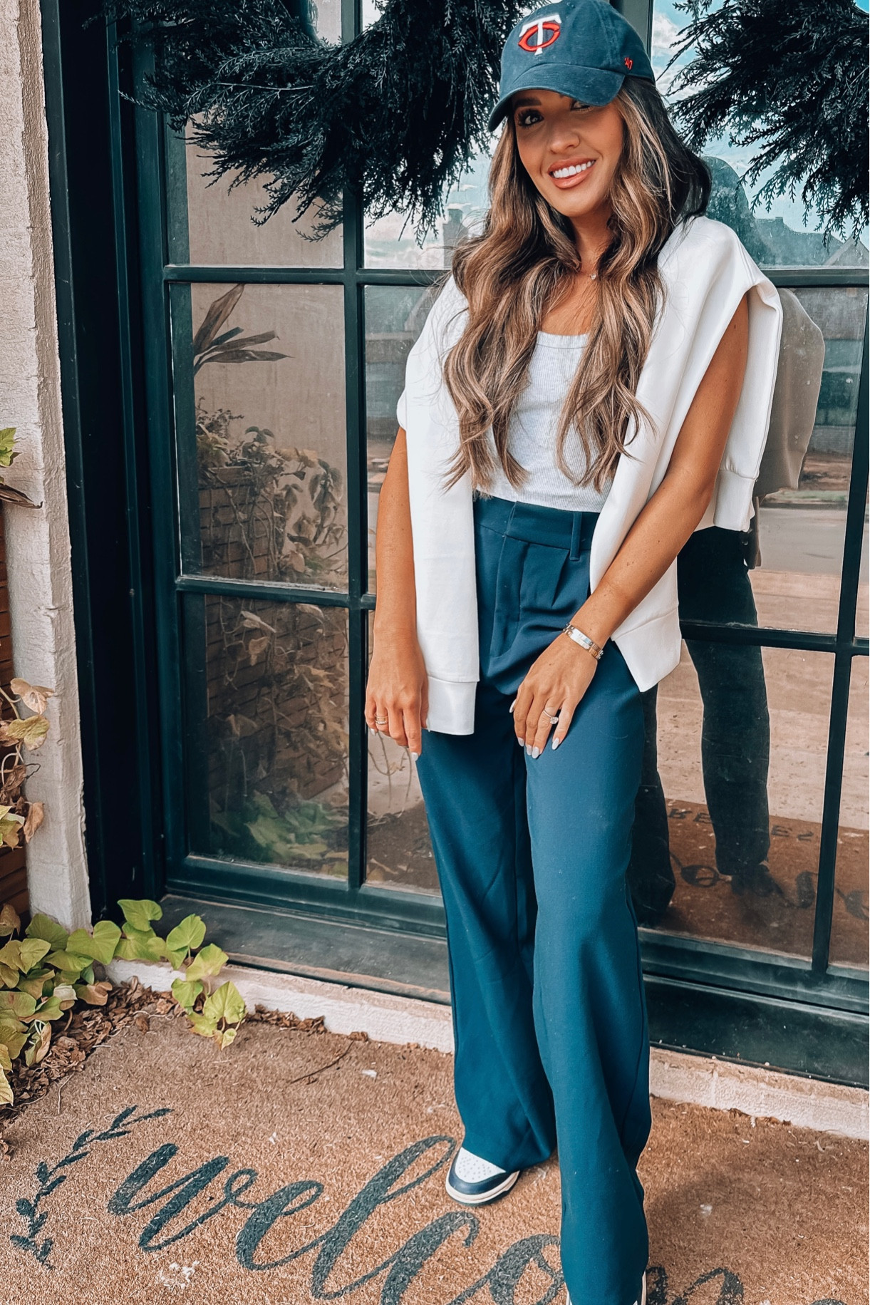 Football game outfit. Abercrombie trousers size 0 regular. And XS tank top. Spanx pullover, Nike dunks, ball cap 

#LTKunder50 #LTKstyletip #LTKunder100