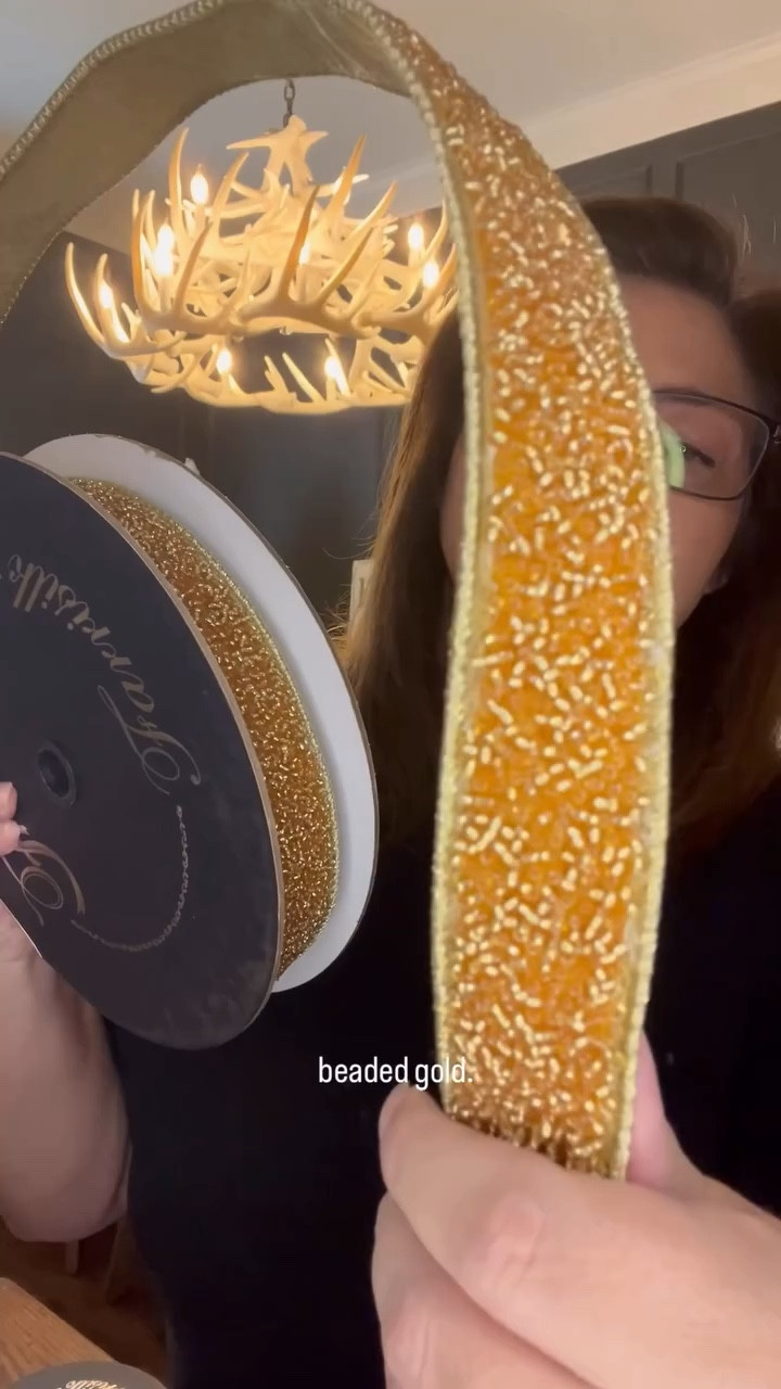 ✨ **Meet “Sprinkles in Gold” — your new favorite accent ribbon!** ✨

This 1” wired ribbon is _covered_ in shimmering gold beads with a gold taffeta back that catches the light beautifully. It’s the perfect touch of texture and sparkle to layer into your Christmas tree, wreaths, or garlands. 🎄💫

Each bolt comes with **10 yards** — plenty of ribbon to get creative and add that designer finish to your holiday décor.

I can’t wait to show you what other ribbons I’ll pair this one with… stay tuned for some seriously stunning combinations! 👀🎀

Comment **“Decor”** to shop the **Sprinkles in Gold Ribbon** and bring a little extra sparkle to your tree this season. ✨

#ChristmasDecor #HolidayHangups #DesignerRibbon #ChristmasDecorating #Gold #HolidayRibbon #Christmas #ribbon #Christmastree