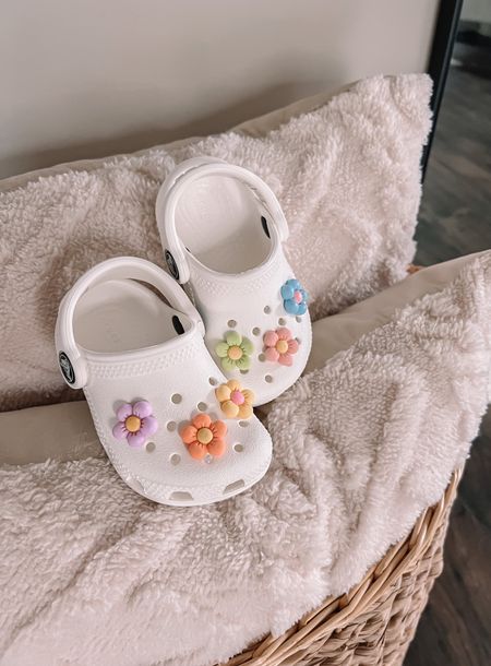 Aren’t these the cutest?! These soft white Crocs looks perfect with these colorful flower jibbitz. Any fun jibbitz are sure to stand out on this perfect neutral shoe. They’re exactly what we need for water play and pool days!

Also tagged my fabulously soft pillow covers. Have them in the beige color.

#LTKkids #LTKbaby #LTKBacktoSchool