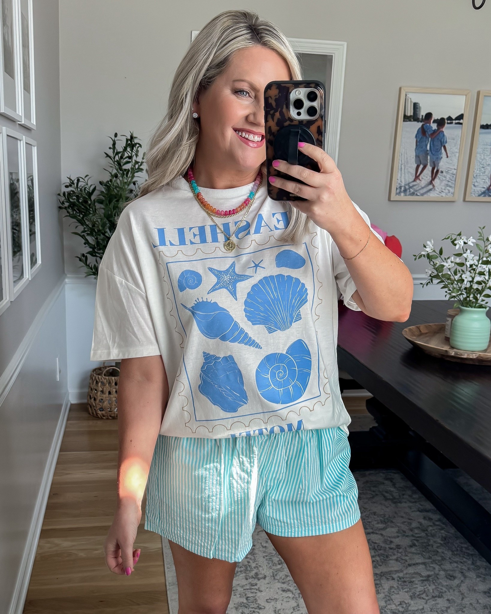 BESTSELLER! This tee is so fun for summer, the graphic gives it that coastal feel and it pairs perfectly with these easy striped shorts for a laid back look

graphic tee summer outfit casual style beachy outfit easy everyday look comfy shorts relaxed style amazon fashion lovelylifestyling

#LTKootd #LTKTravel #LTKSeasonal