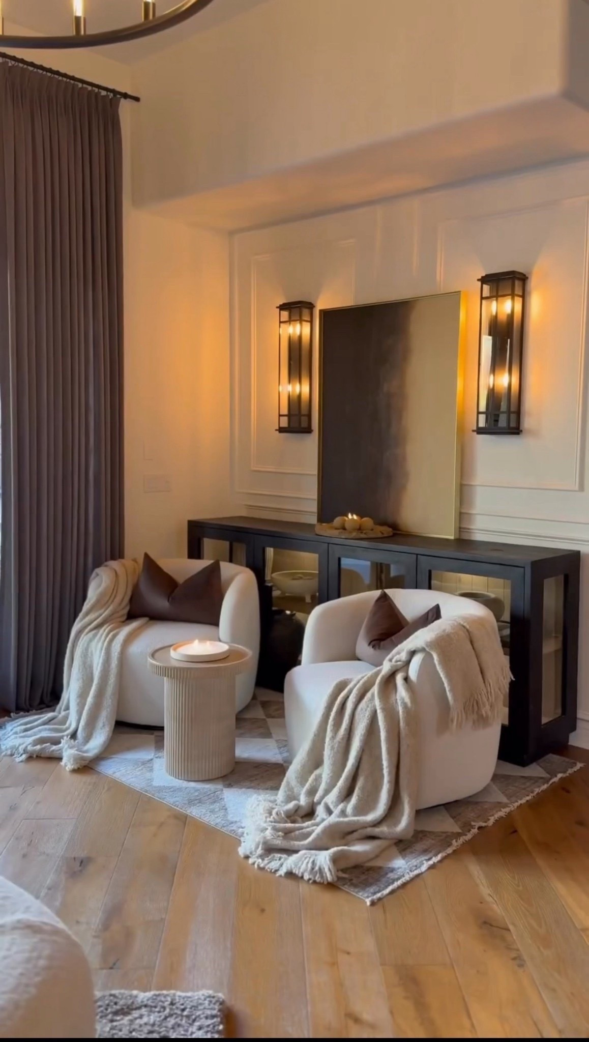 Loving this corner styled a little differently 🤎 The contrast of the black console with soft fabrics and warm lighting gives it such a cozy feel.

#neutralhomestyle
#moderninteriordesign
#cozycornerinspo
#warmminimalism
#homeinspiration

#summerthompsonstyles


#LTKdayinmylife #LTKU #LTKHome