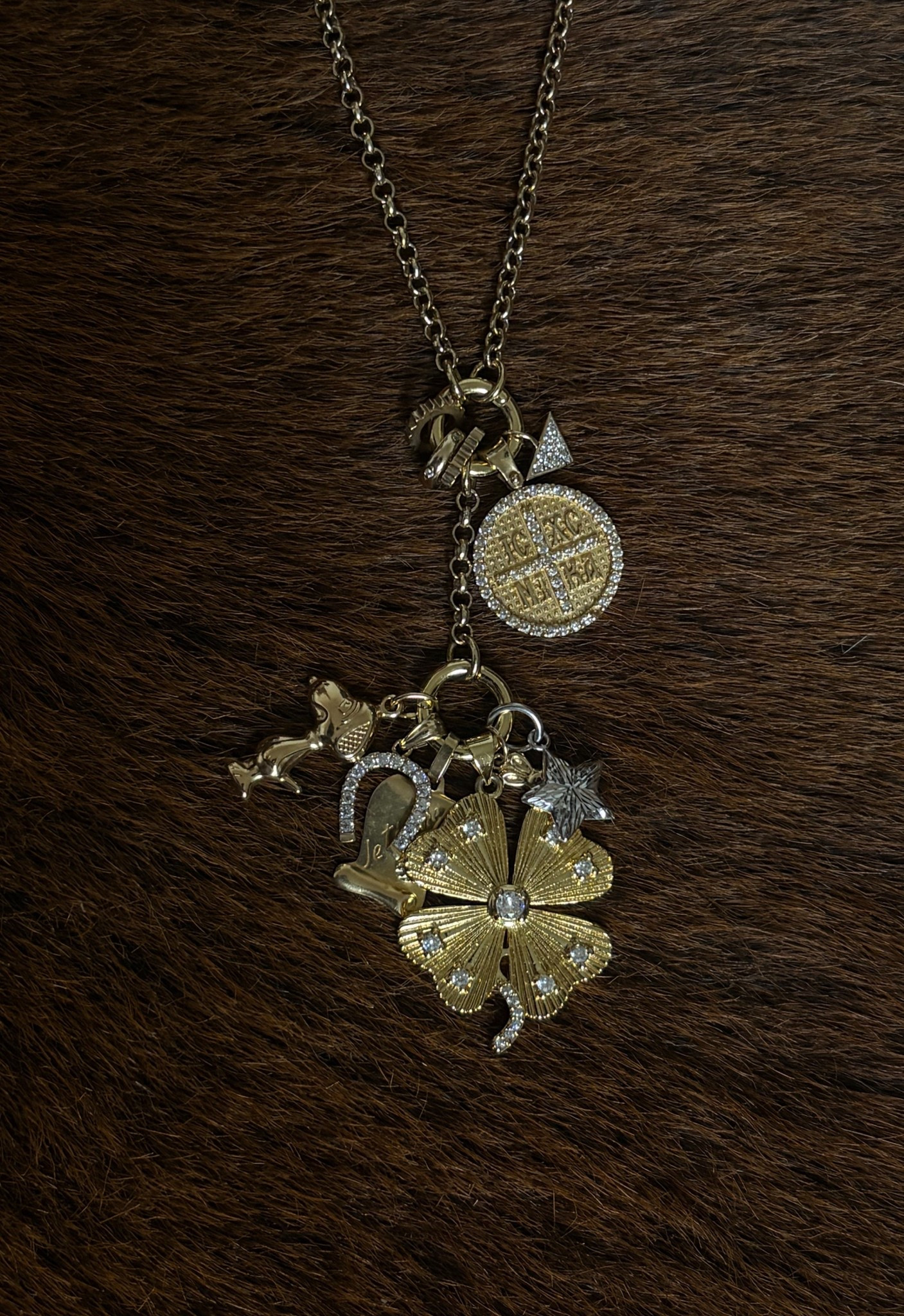 Adding some new charms to my charm necklace !!
