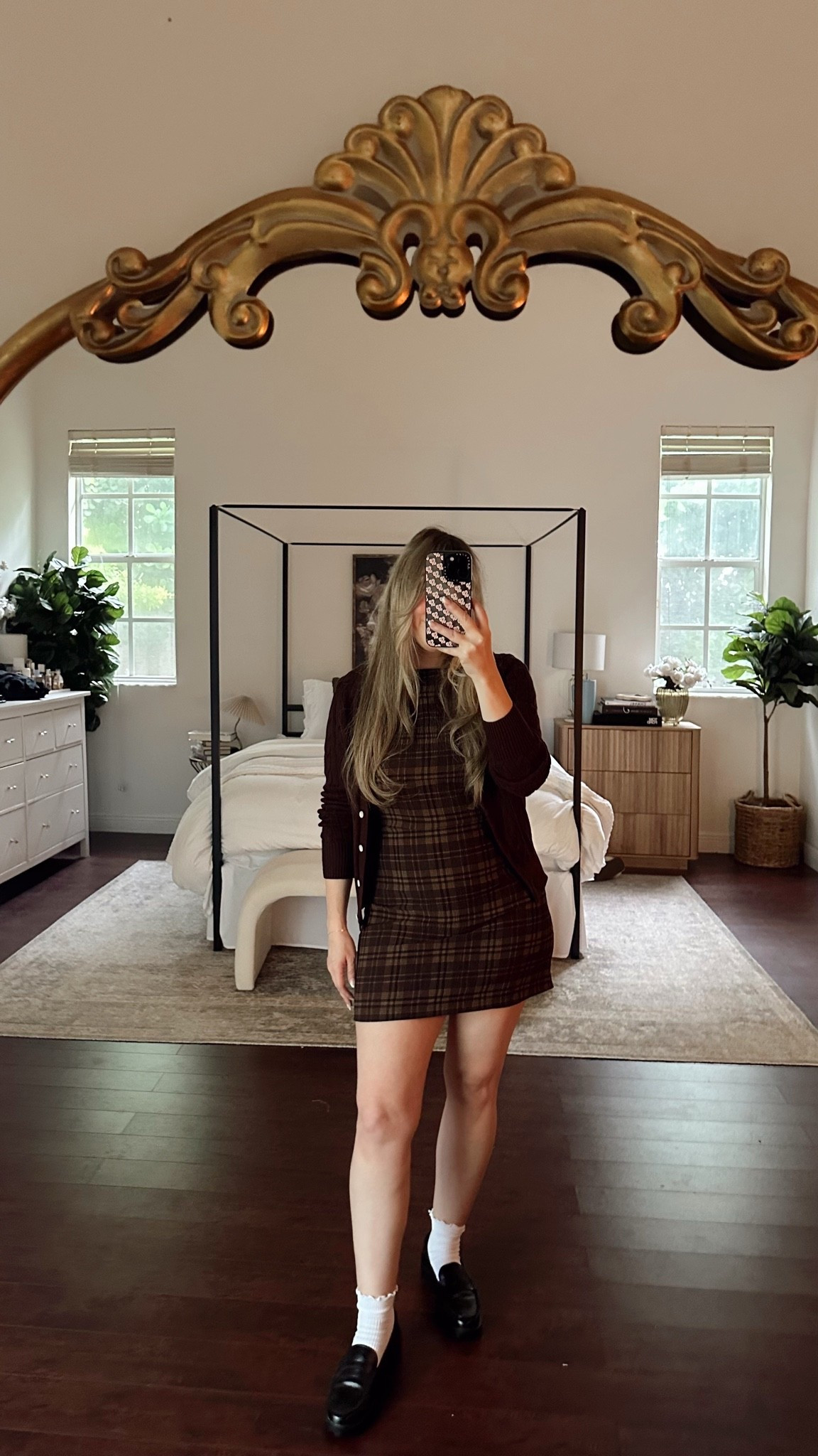 Fall outfit of the day - plaid mini dress and cardigan with loafers for a preppy collegiate outfit

#LTKootd