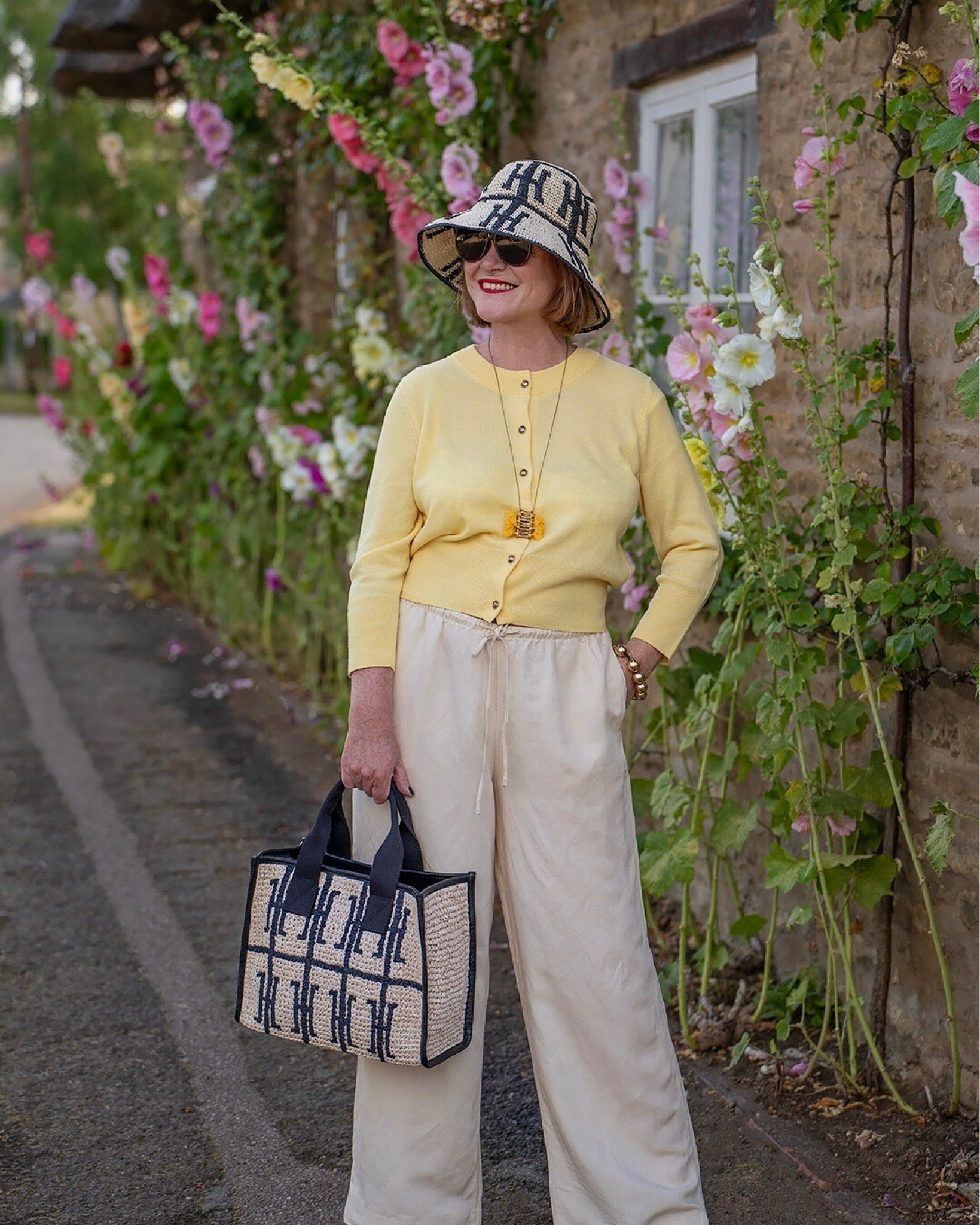 Gorgeous statement bag and lemon wool cashmere cardi from Hobbs London.

#LTKuk #LTKover50style #LTKsummer