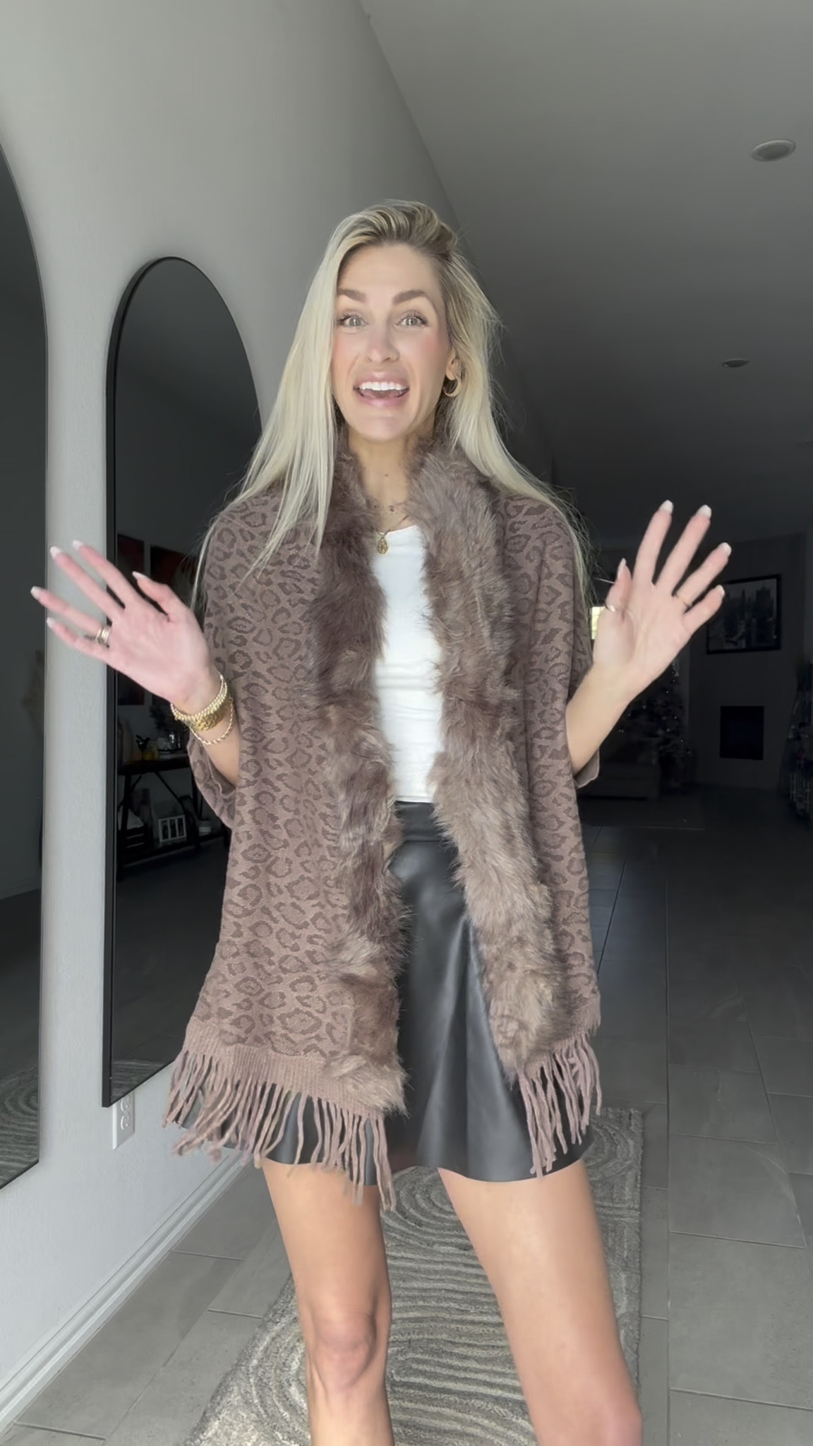 f you love statement pieces, this cardigan is it! The full faux fur collar is soft and dramatic without being itchy. The leopard print is bold but super chic, and the tassel hem adds a fun boho touch. It’s warm, cozy, and instantly upgrades a basic outfit. I styled it with jeans, a bodysuit, and boots — and it honestly looks like a designer piece for a fraction of the price. Winter glam? YES please! 

 

#LTKCyberWeek #LTKgrwm #LTKootd