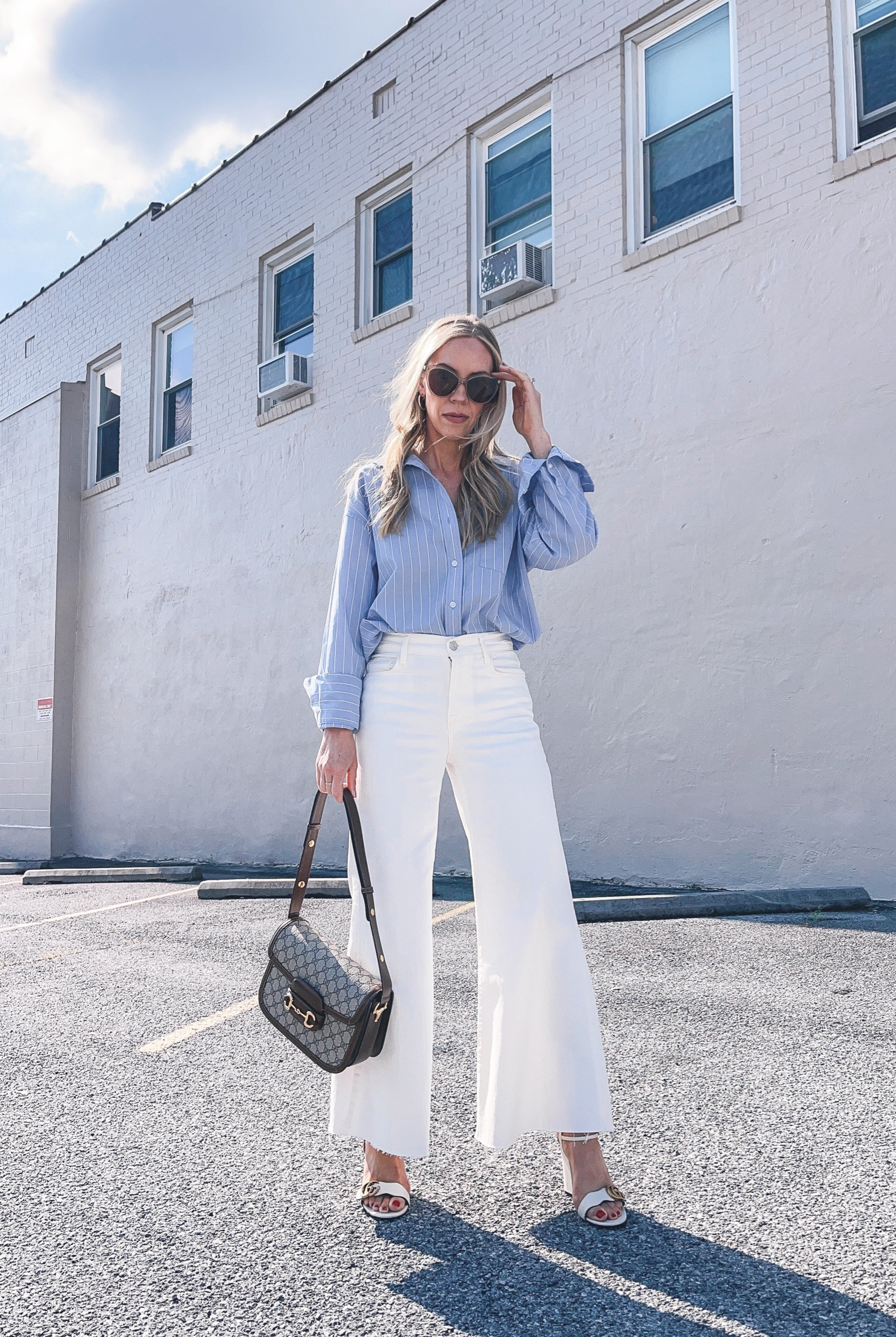 25% off these white wide leg jeans with code 25SUMMER (sale ends tomorrow)

Pre fall style, transitional outfit, white jeans, blue button down shirt, Gucci horsebit bag

#LTKsalealert #LTKstyletip #LTKitbag
