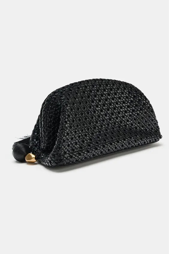 DescriptionContentsMeasurementsWoven pouch-style handbag with a patent finish. Tassel with metall... | Zara US