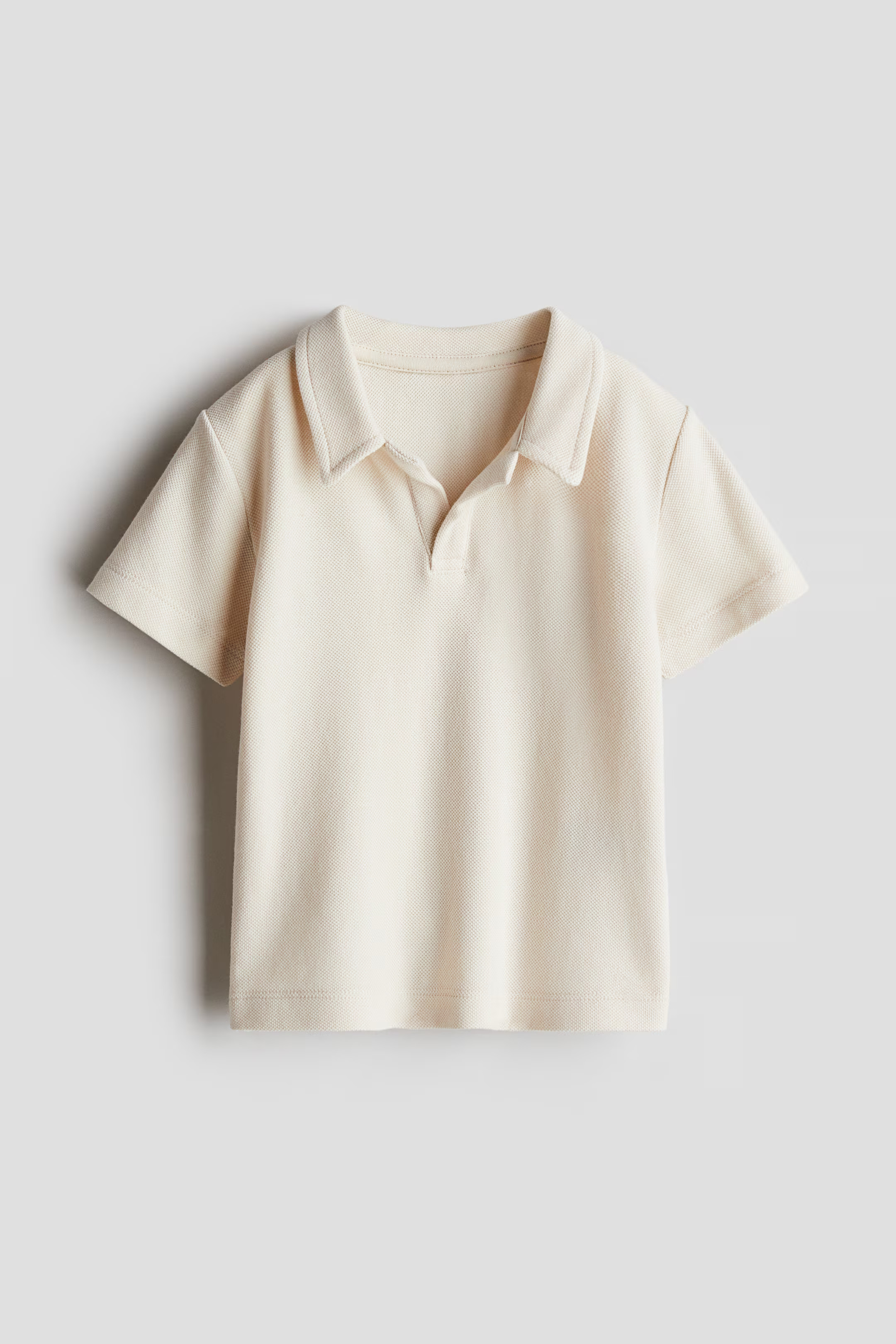 Cotton piqué polo shirt | H&M (UK, MY, IN, SG, PH, TW, HK)